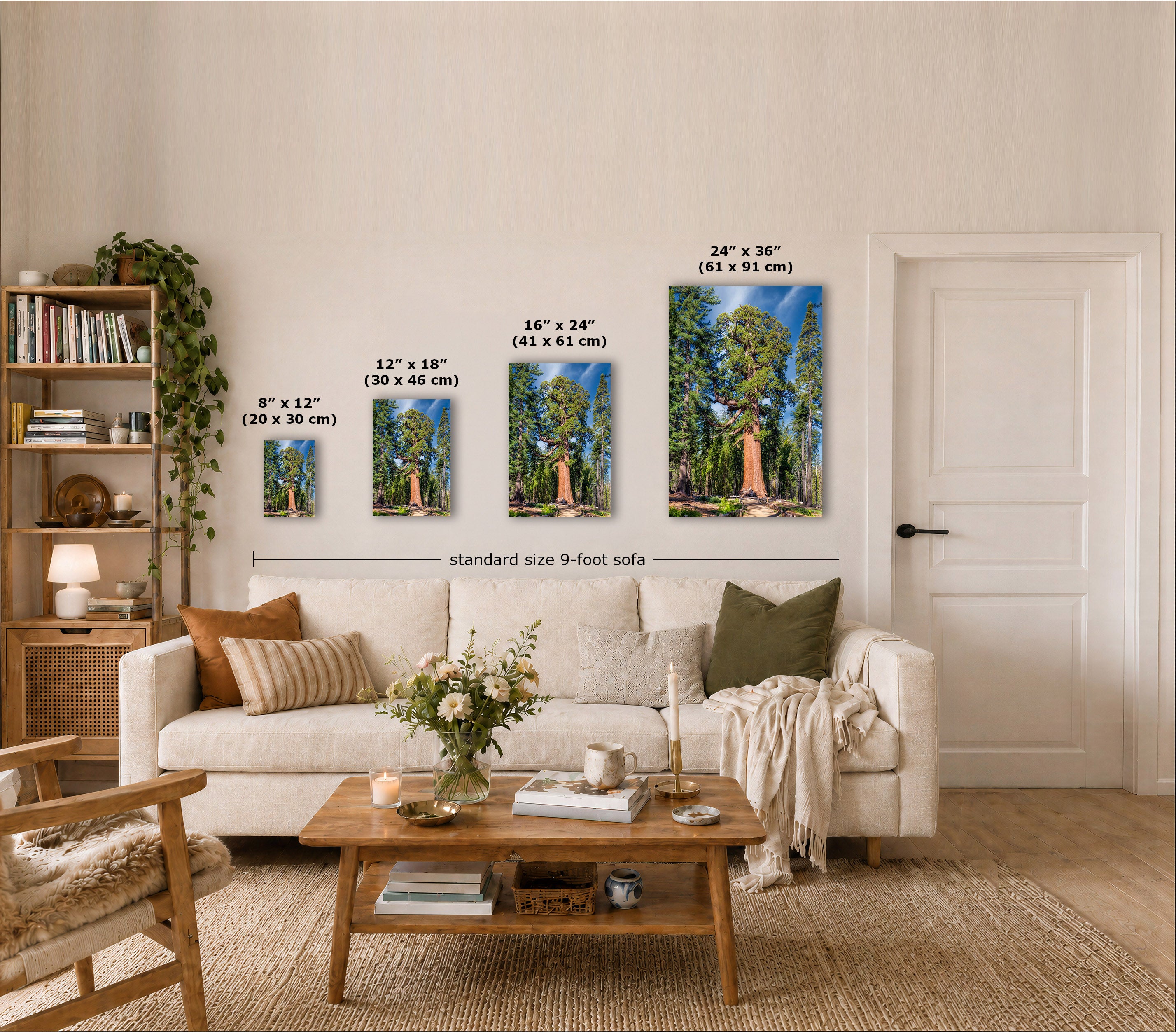 A staged living room shows four vertical wall art prints of the same forest scene, each labeled with different dimensions. The prints are displayed above a cream sofa, with a coffee table, rug, bookshelf, and door visible in the room.