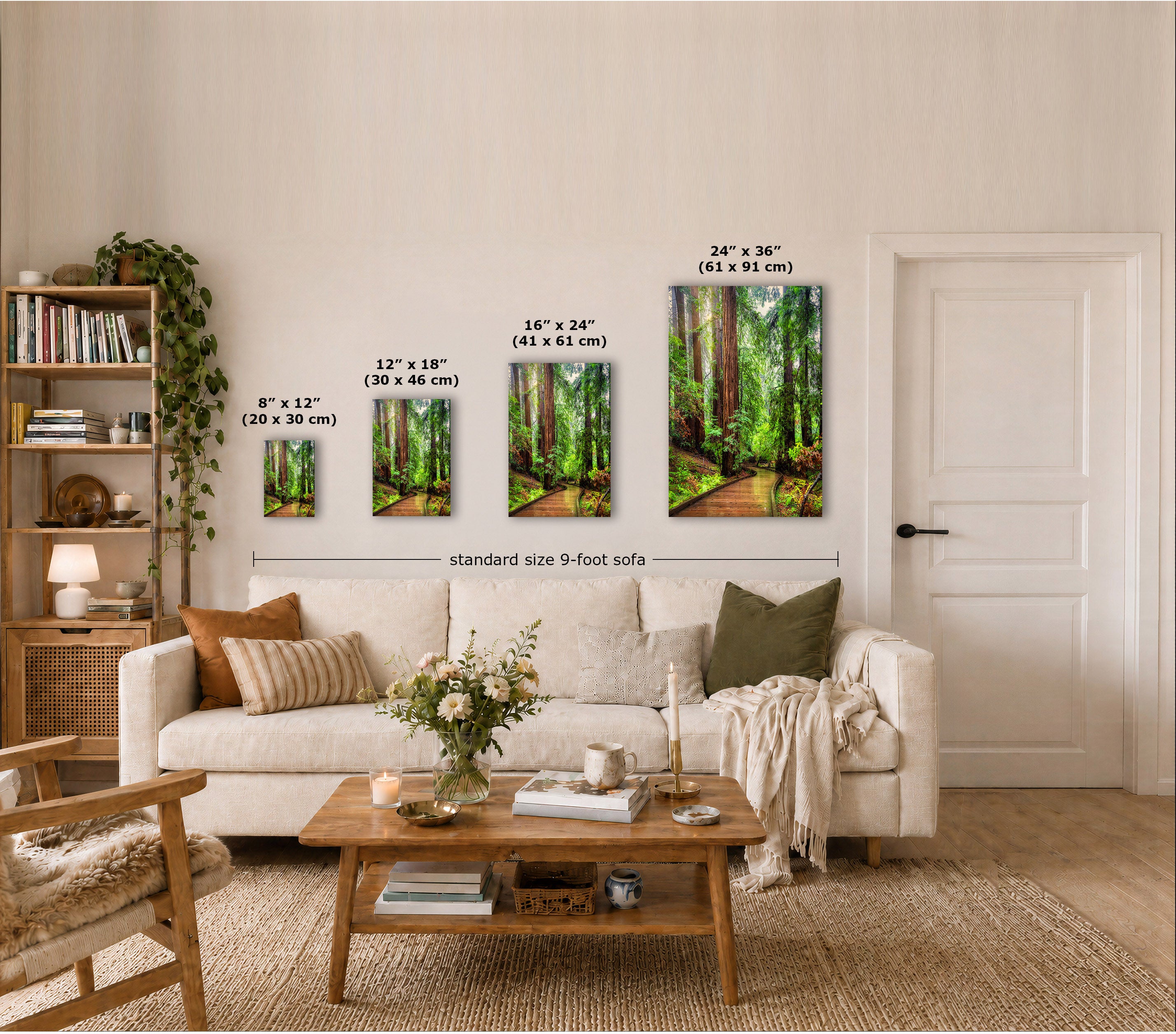 A staged living room showing a set of four vertical forest wall art prints above a sofa, with size labels overlaid on each print. The room includes a cream sofa, wooden coffee table, bookshelf, and a white door.