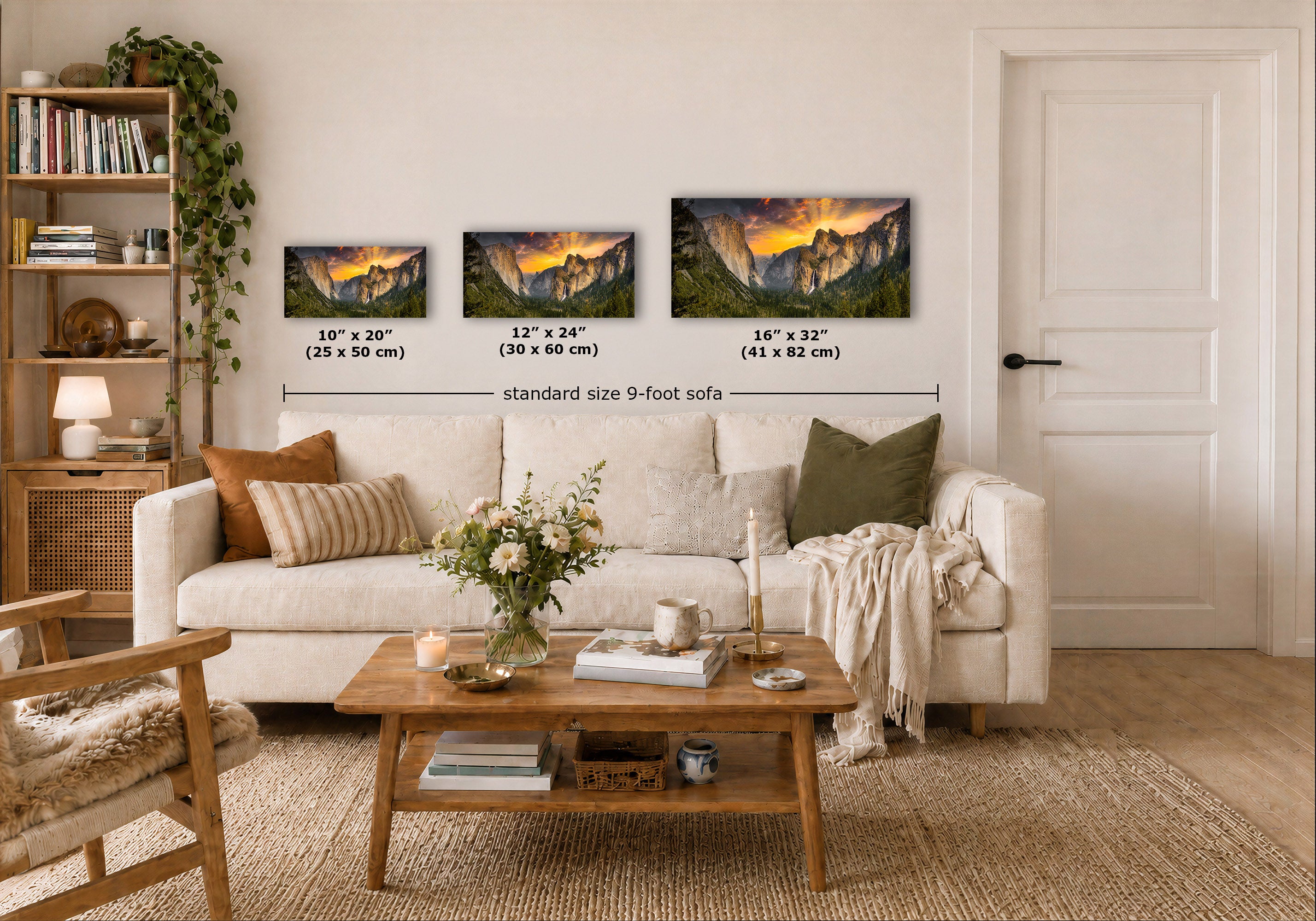 Three framed landscape art prints of a mountain sunset are displayed on a beige wall above a white sofa in a styled living room. The prints show different sizes (10" x 20", 12" x 24", 16" x 32") with dimension lines and text indicating they fit a 9-foot sofa.