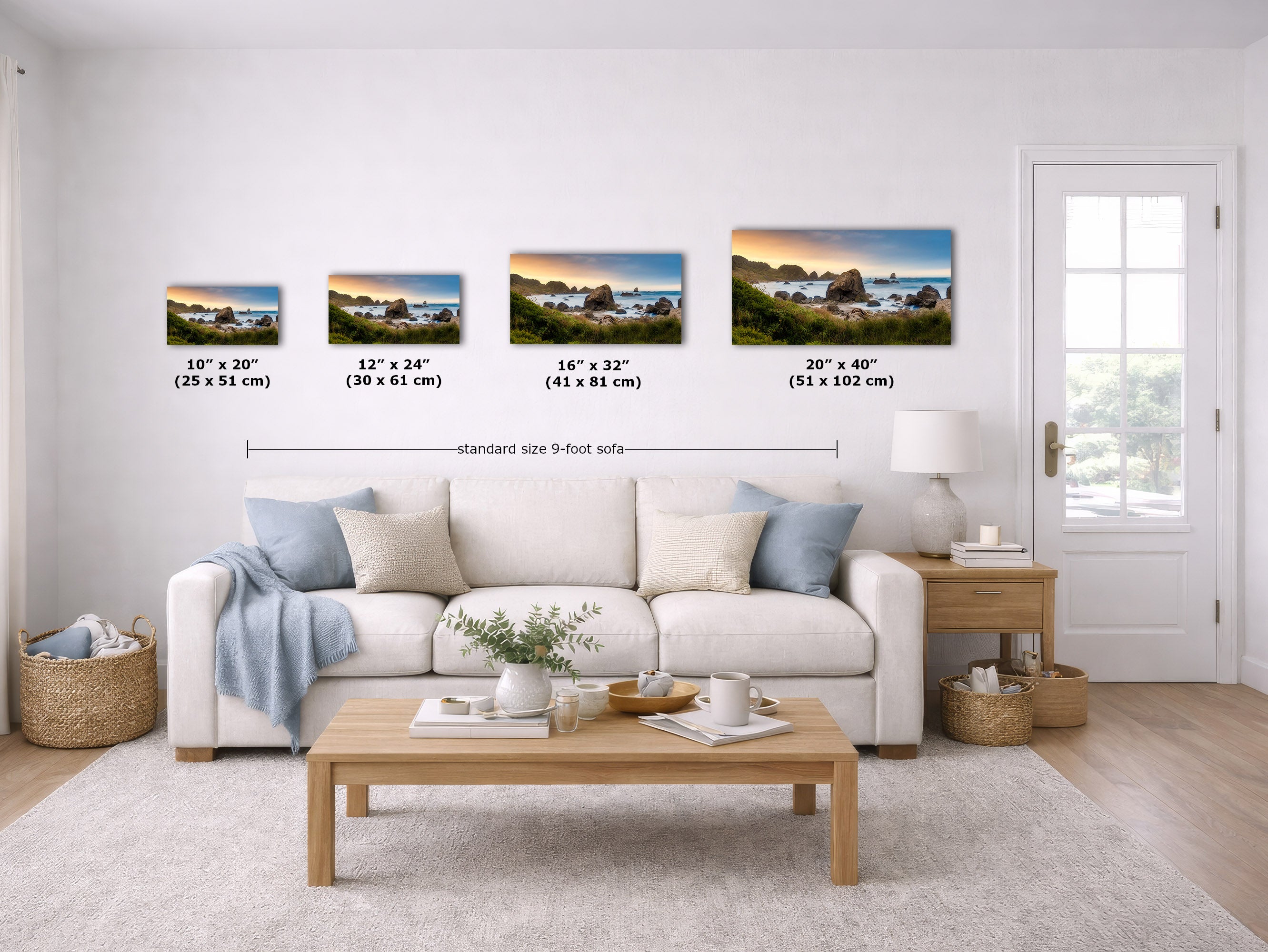 A staged living room shows four coastal landscape prints mounted on a white wall above a sofa. The prints are labeled with dimensions: 10" x 20", 12" x 24", 16" x 32", and 20" x 40", with a line indicating standard size 9-foot height.