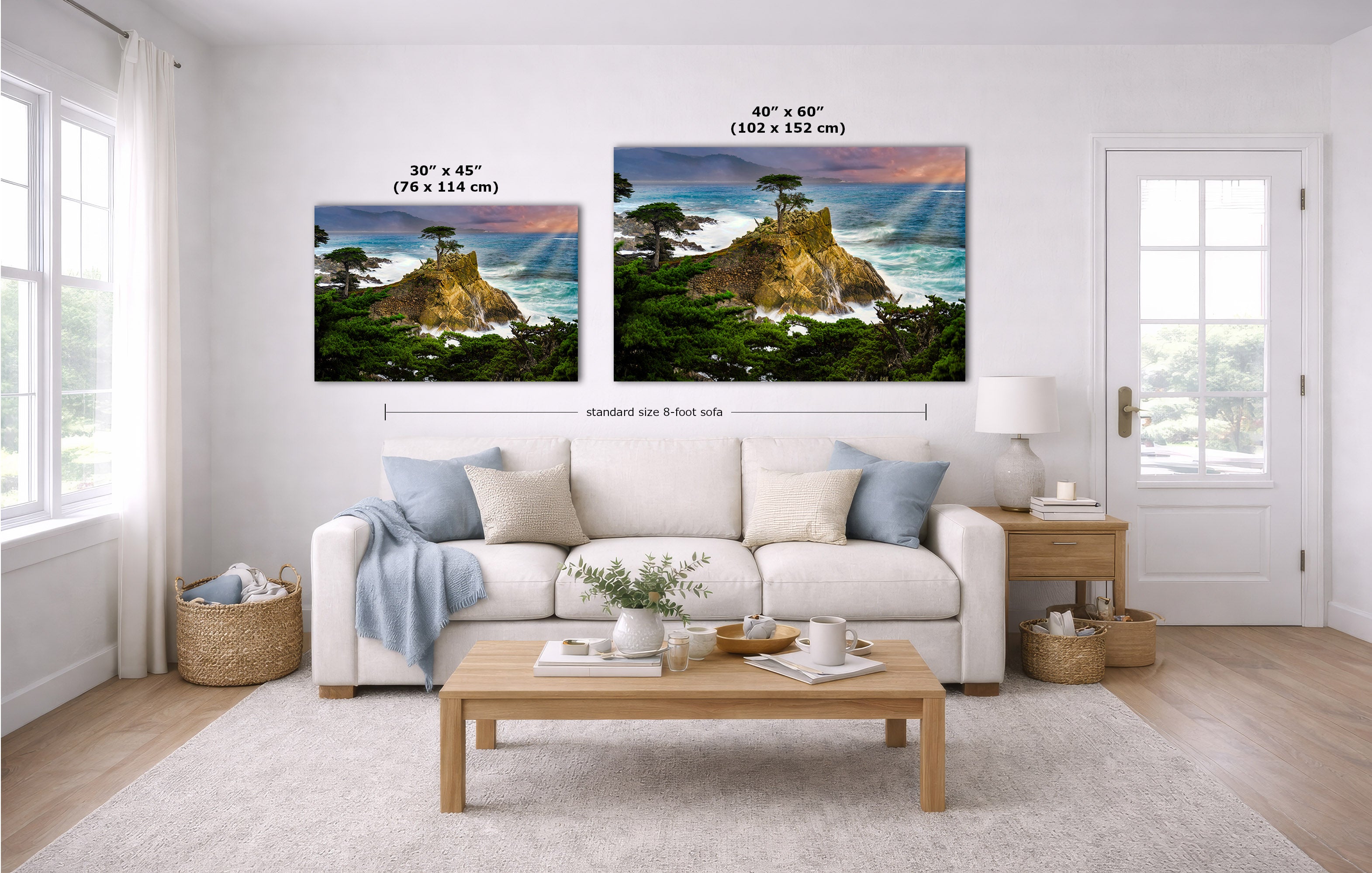 Two coastal landscape wall art prints of the Lone Cypress tree are shown hanging above a white sofa in a bright living room. The left print is labeled 30 x 45 inches, and the right print is labeled 40 x 60 inches, with a dimension line between them.