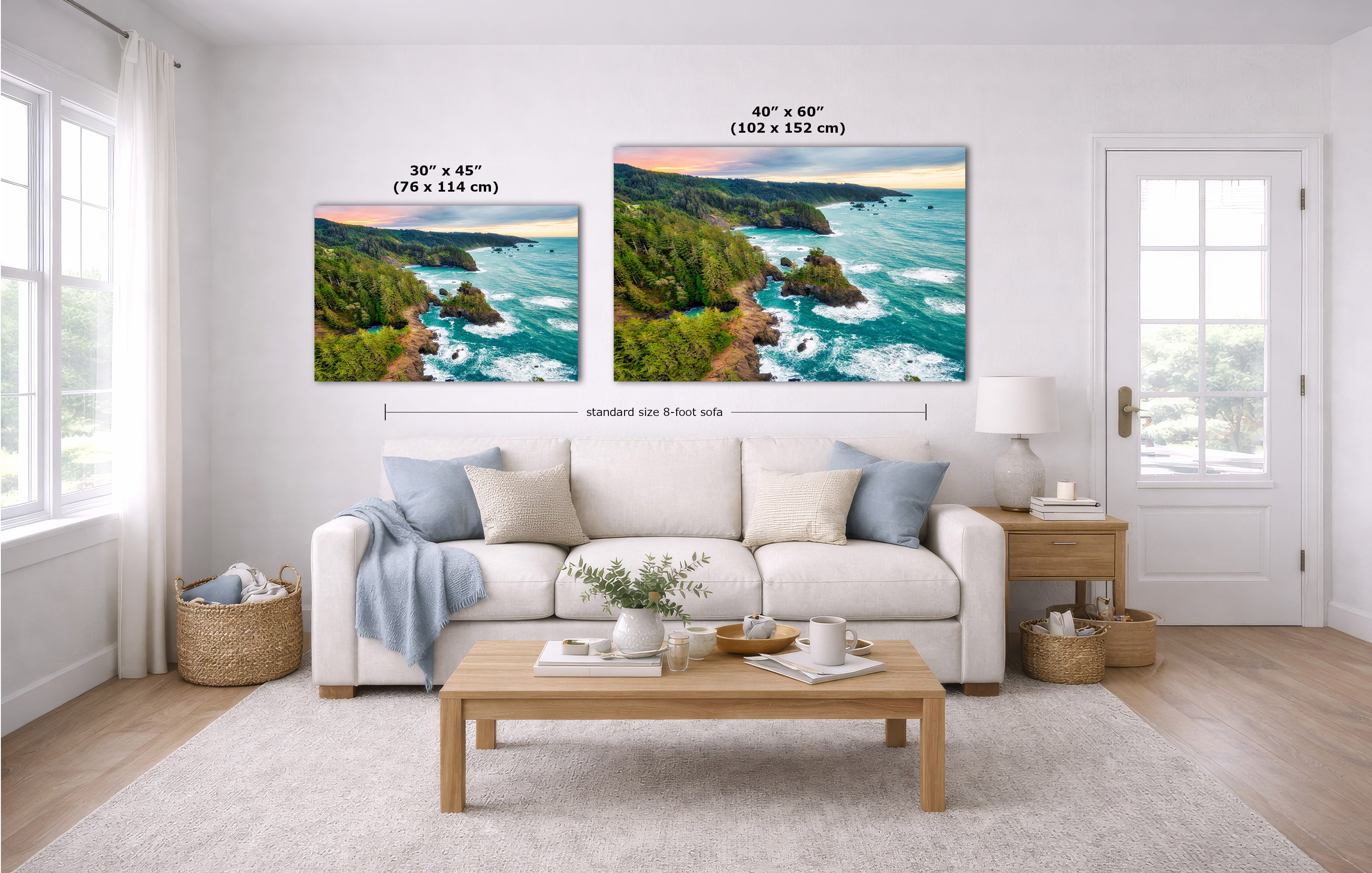A staged living room with a white sofa, coffee table, and two coastal landscape prints above the couch. The prints show turquoise ocean water, green cliffs, and a sunset sky, with size labels and dimension lines indicating 30 x 45 inches and 40 x 60 inches.