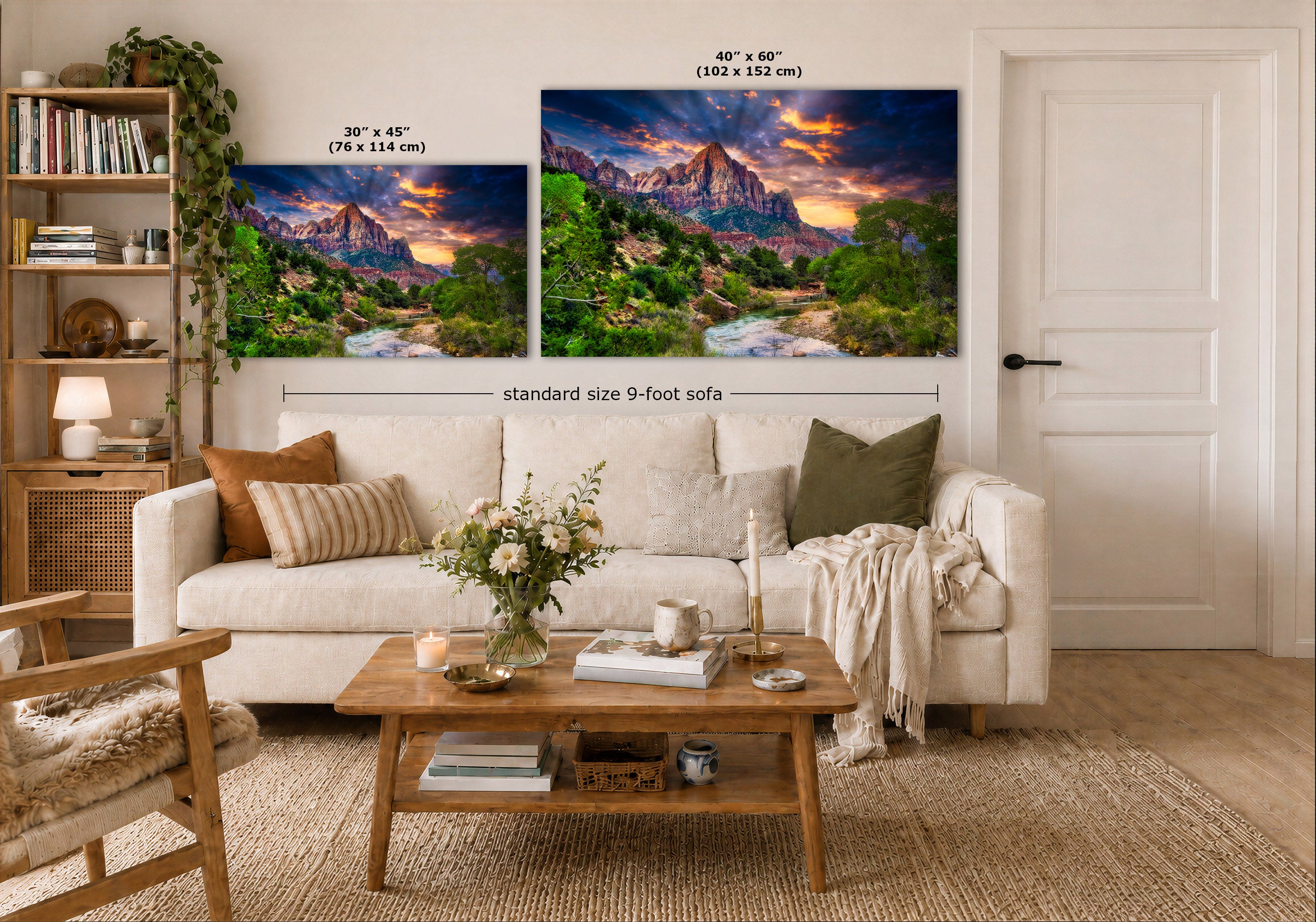 Two wall art prints showing colorful mountain landscape scenes are displayed above a white sofa in a styled living room. The left print is labeled 30 x 45 inches, the right print 40 x 60 inches, and a dimension line notes the standard size 9-foot sofa width.