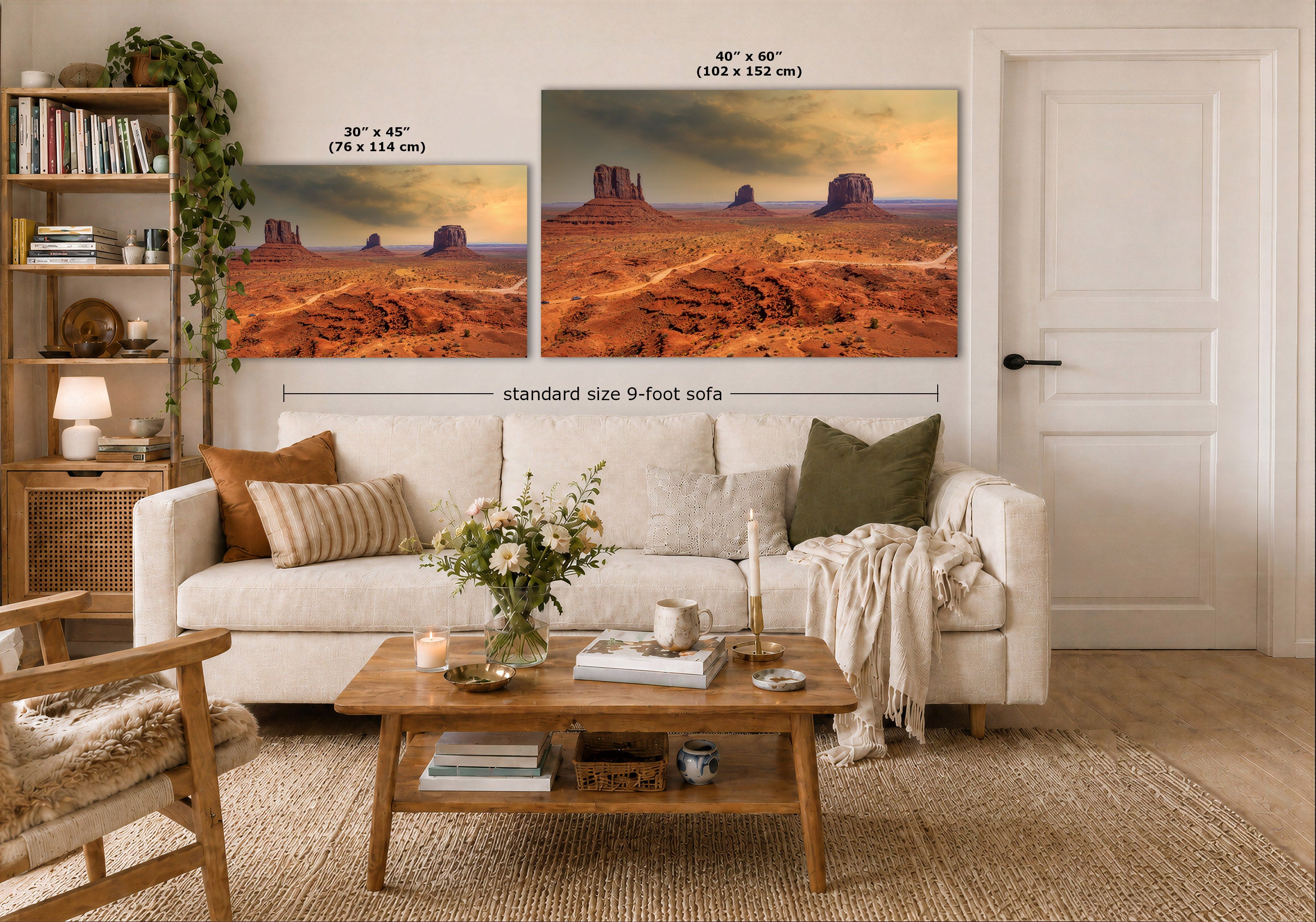A staged living room shows two desert landscape wall art prints above a white sofa. The left print is labeled 30 x 45 inches, and the larger right print is labeled 40 x 60 inches, with text indicating standard size 9-foot sofa spacing.