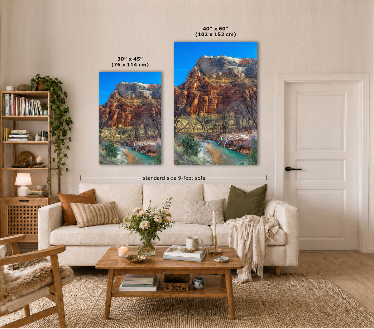 Two vertical canvas prints showing red rock desert mountains and a river, displayed above a white sofa in a styled living room. White dimension lines and text indicate the sizes 30 x 45 inches and 48 x 60 inches.