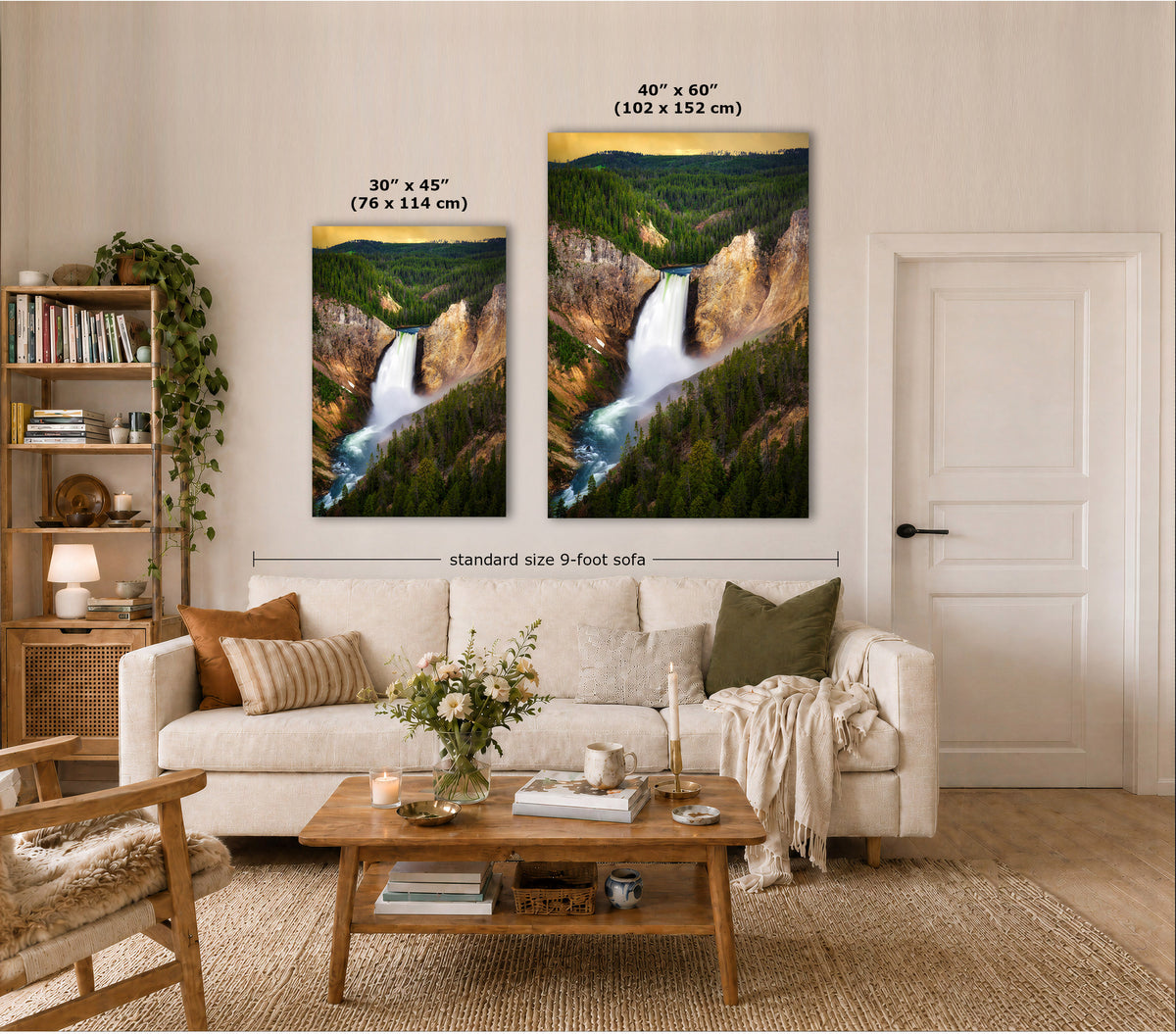 Two vertical canvas prints showing Yellowstone National Park landscapes with waterfalls, displayed above a cream sofa in a styled living room. Text overlays indicate the sizes of both prints and a standard 9-foot sofa.