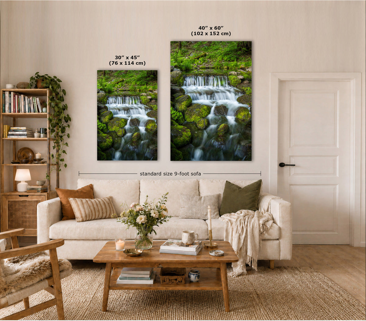 Two vertical canvas prints showing waterfall scenes in a bright living room. The left print is labeled 30 x 45 inches, and the right print is labeled 40 x 60 inches, with a dimension line indicating the standard size 9-foot sofa width.