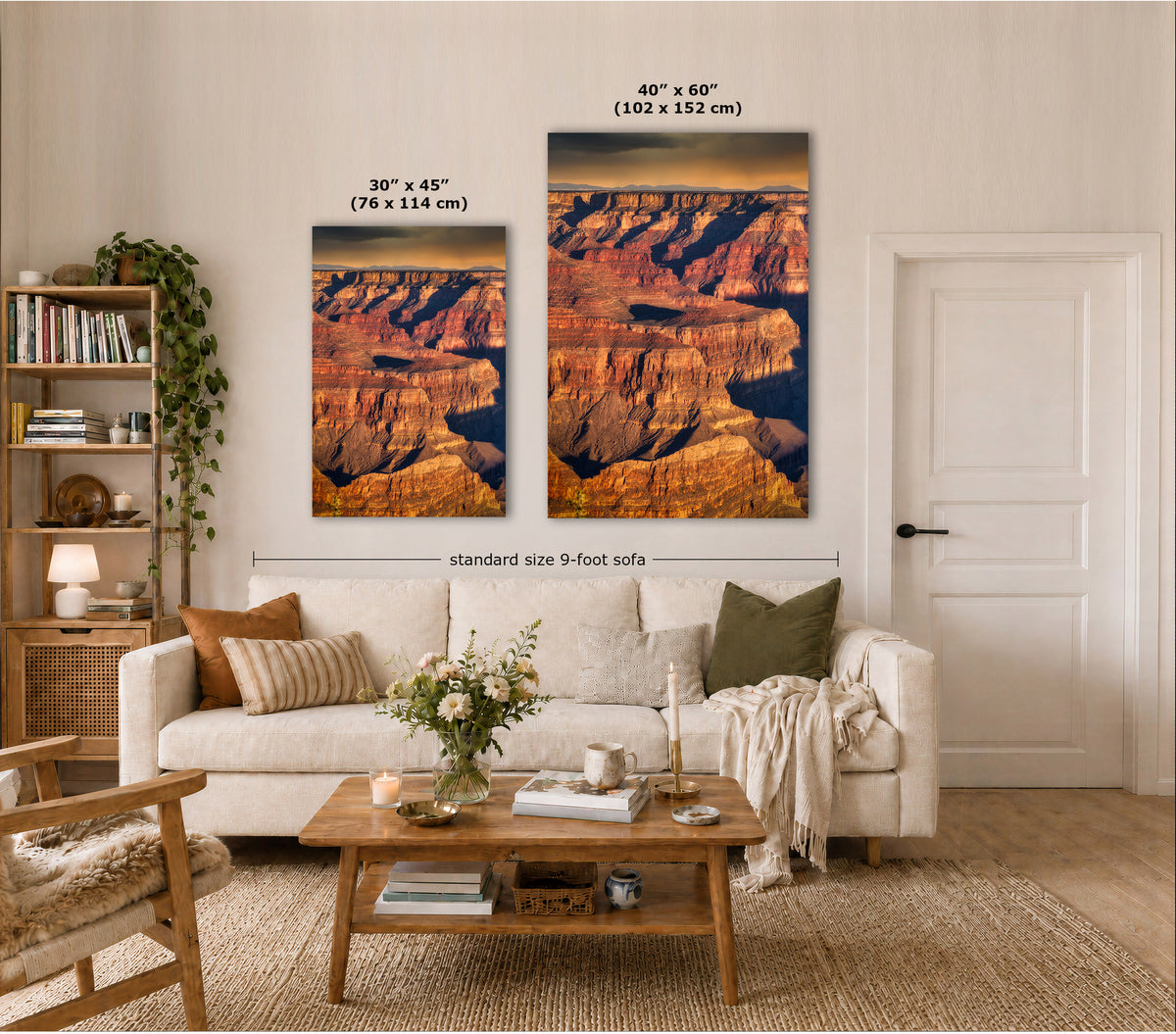 Two vertical Grand Canyon wall art prints displayed above a white sofa in a styled living room. The left print is labeled 30 x 45 inches, and the larger right print is labeled 48 x 60 inches.