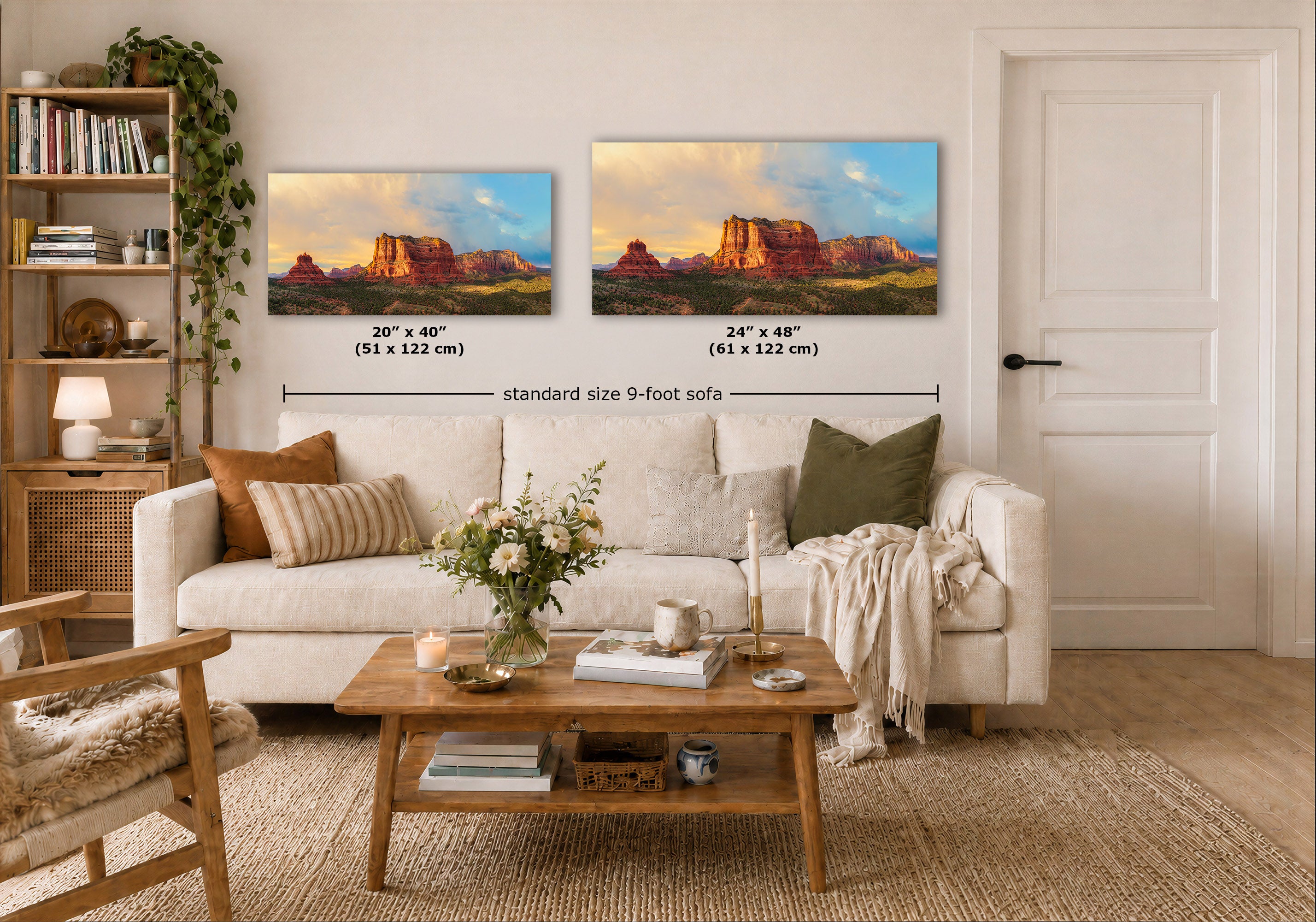 Two framed landscape wall art prints showing red rock desert formations are displayed above a white sofa in a styled living room. Black dimension lines and text indicate the sizes: 20 x 40 inches (51 x 122 cm) and 24 x 48 inches (61 x 122 cm), with 'standard size 9-foot sofa' written below.