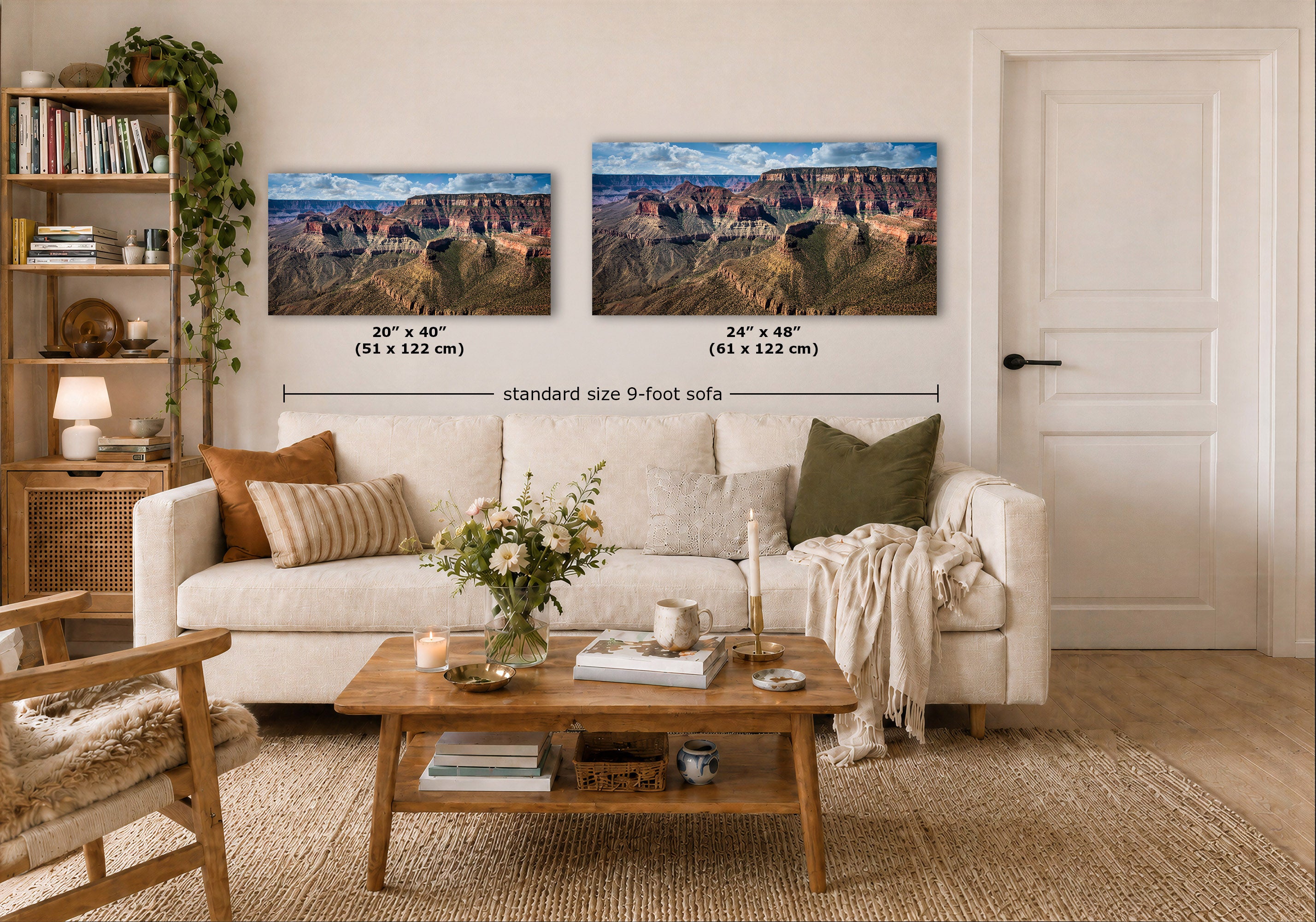 Two Grand Canyon landscape wall art prints displayed above a white sofa in a bright, modern living room. The left print is labeled 20" x 40" (51 x 122 cm) and the right print is labeled 24" x 48" (61 x 122 cm), with a dimension line indicating the standard size 9-foot sofa height.