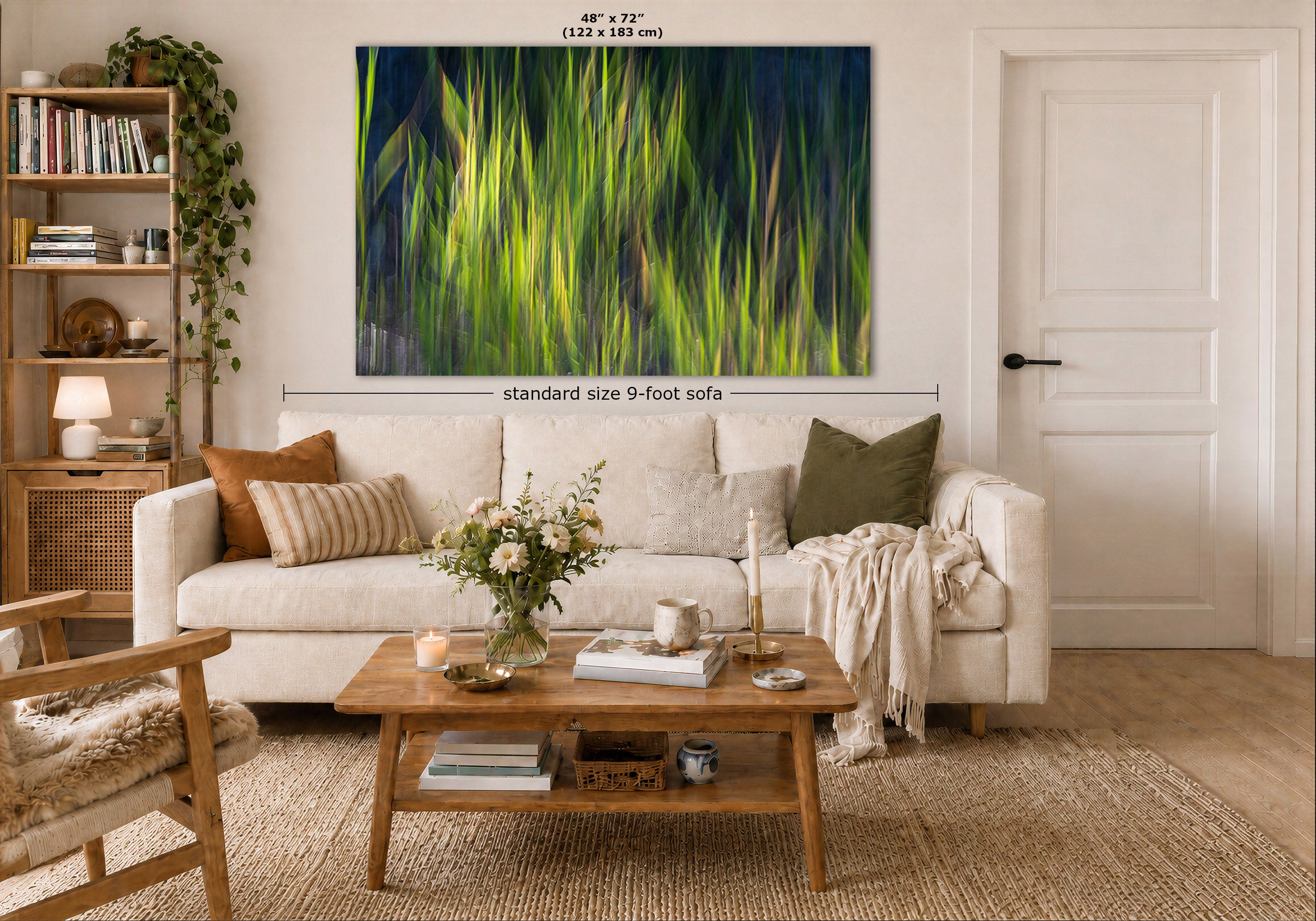 A large framed abstract canvas print featuring vibrant green and black brushstrokes, displayed on a beige wall above a white sofa in a modern, well-lit living room. Measurement labels indicate the canvas is 48 x 72 inches.