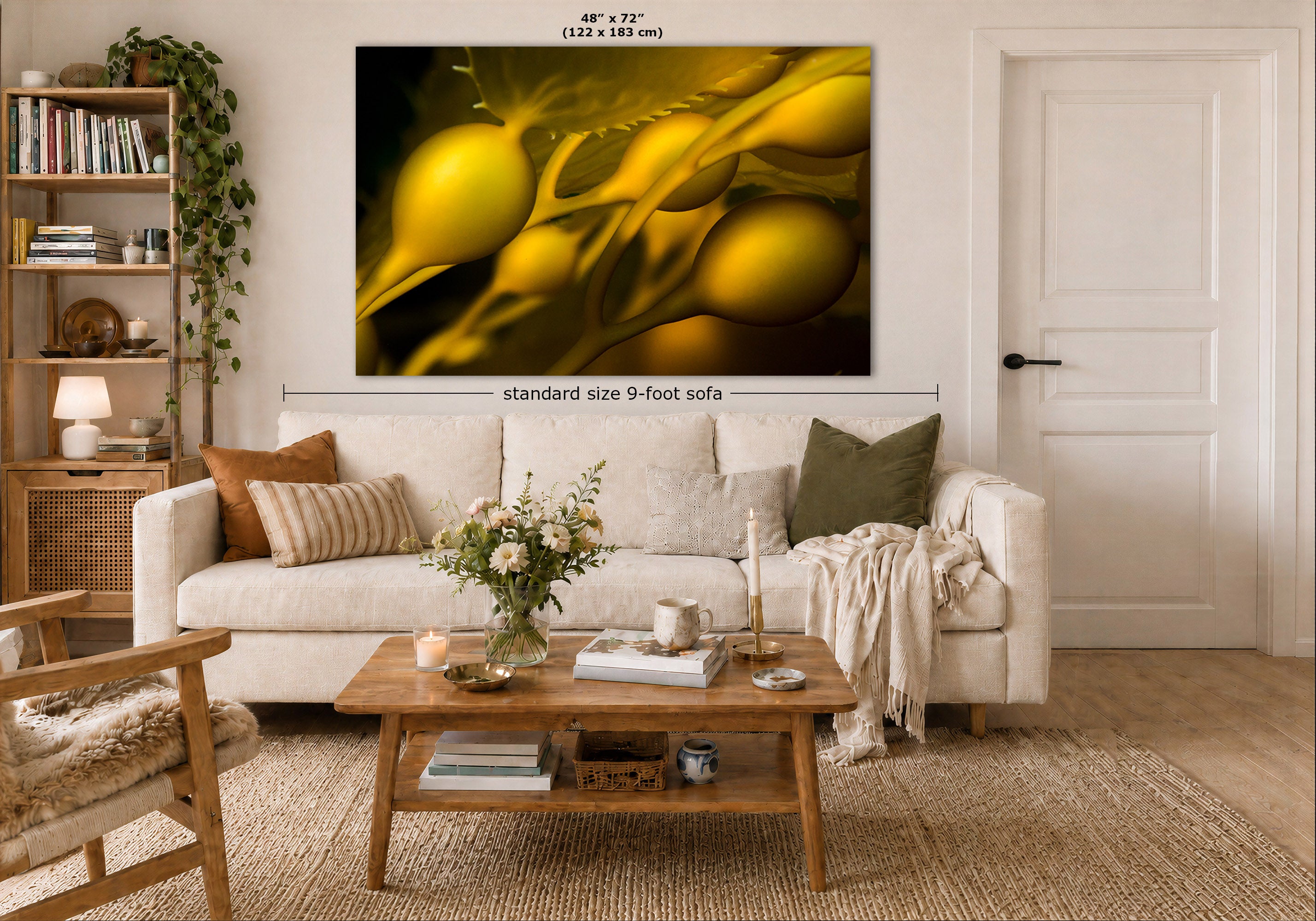 A large wall art print showing a close-up of glossy yellow-green underwater art, displayed above a white sofa in a styled living room. Measurement text indicates the print is 48 x 72 inches, and a dimension line notes standard size 9-foot sofa placement.