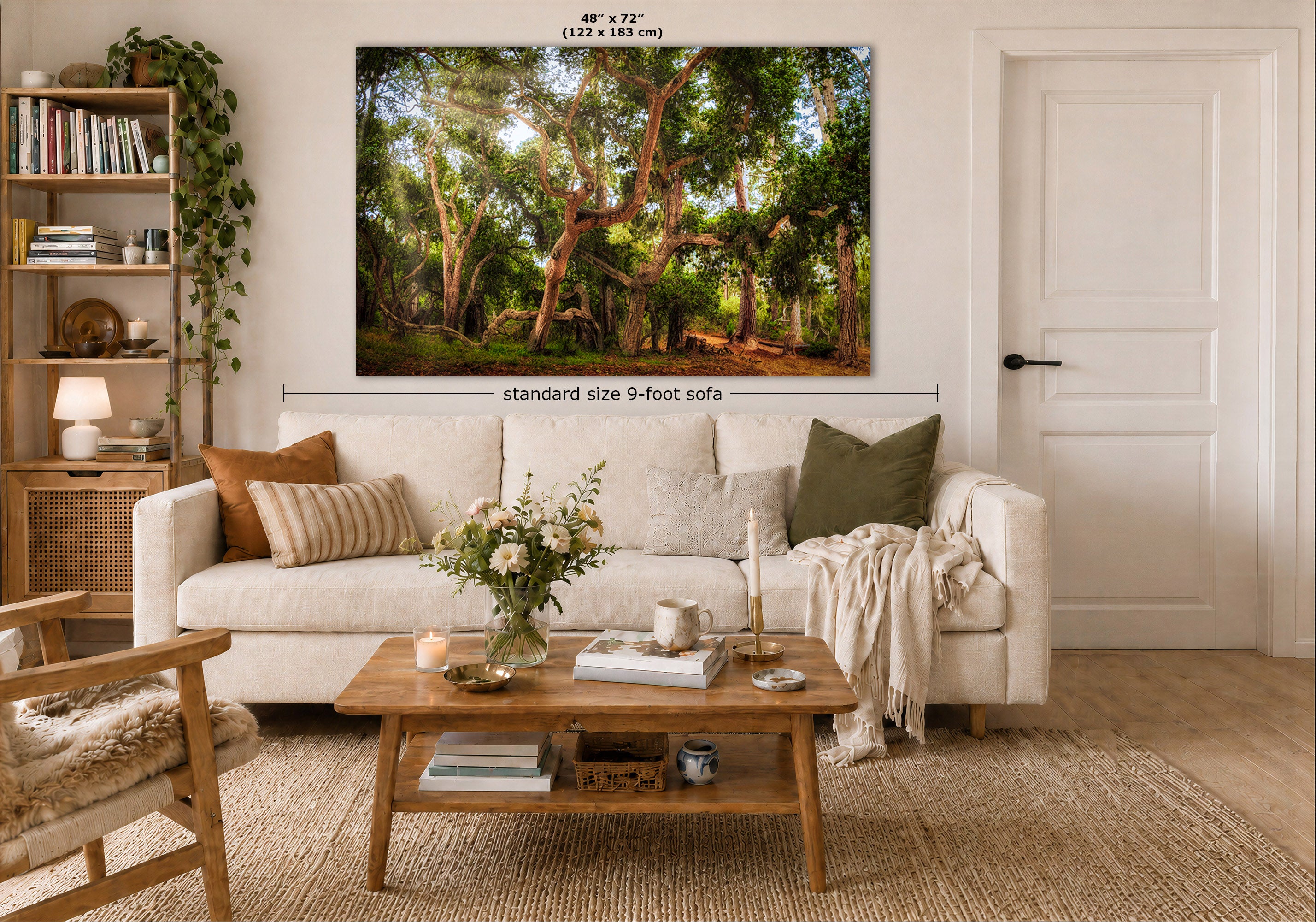 A large framed wall art print depicting a lush green forest with sunlight filtering through trees, displayed above a white sofa in a modern, neutral-toned living room. Measurement labels indicate the print is 48 x 72 inches (standard size 9-foot sofa).