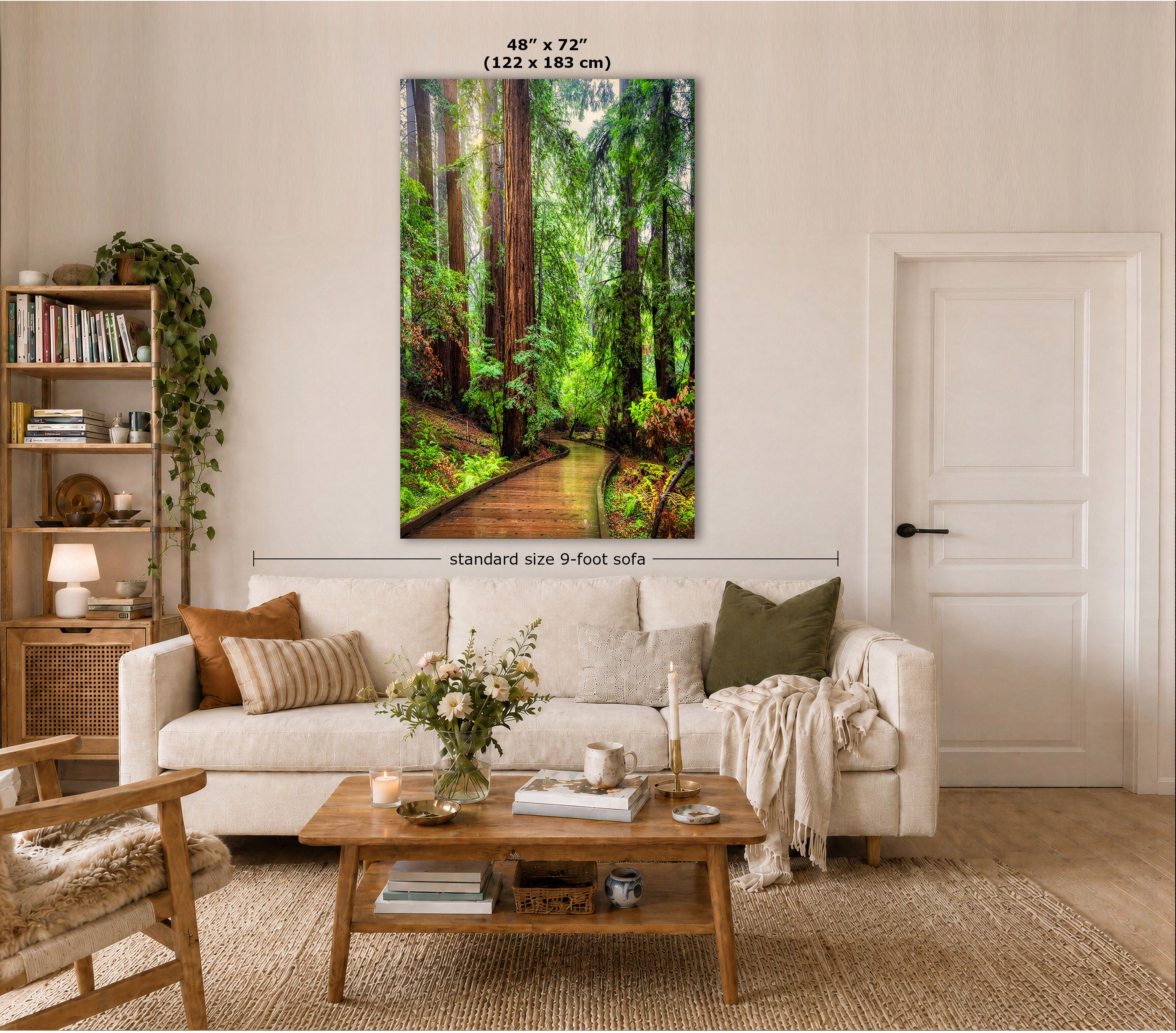 A large vertical wall art print showing a lush green forest path, displayed above a white sofa in a styled living room. Text overlays indicate the dimensions as 48" x 72" (122 x 183 cm) and a standard 9-foot size.