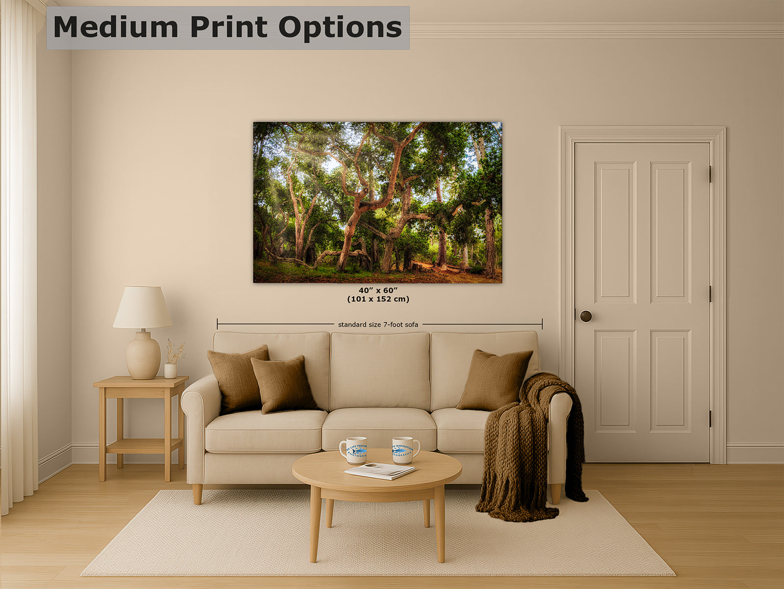 A wall art print showing a sunlit coast live oak forest scene with trees and green foliage, displayed above a beige sofa in a styled living room. The image includes the text 'Medium Print Options' and size markings for the print.