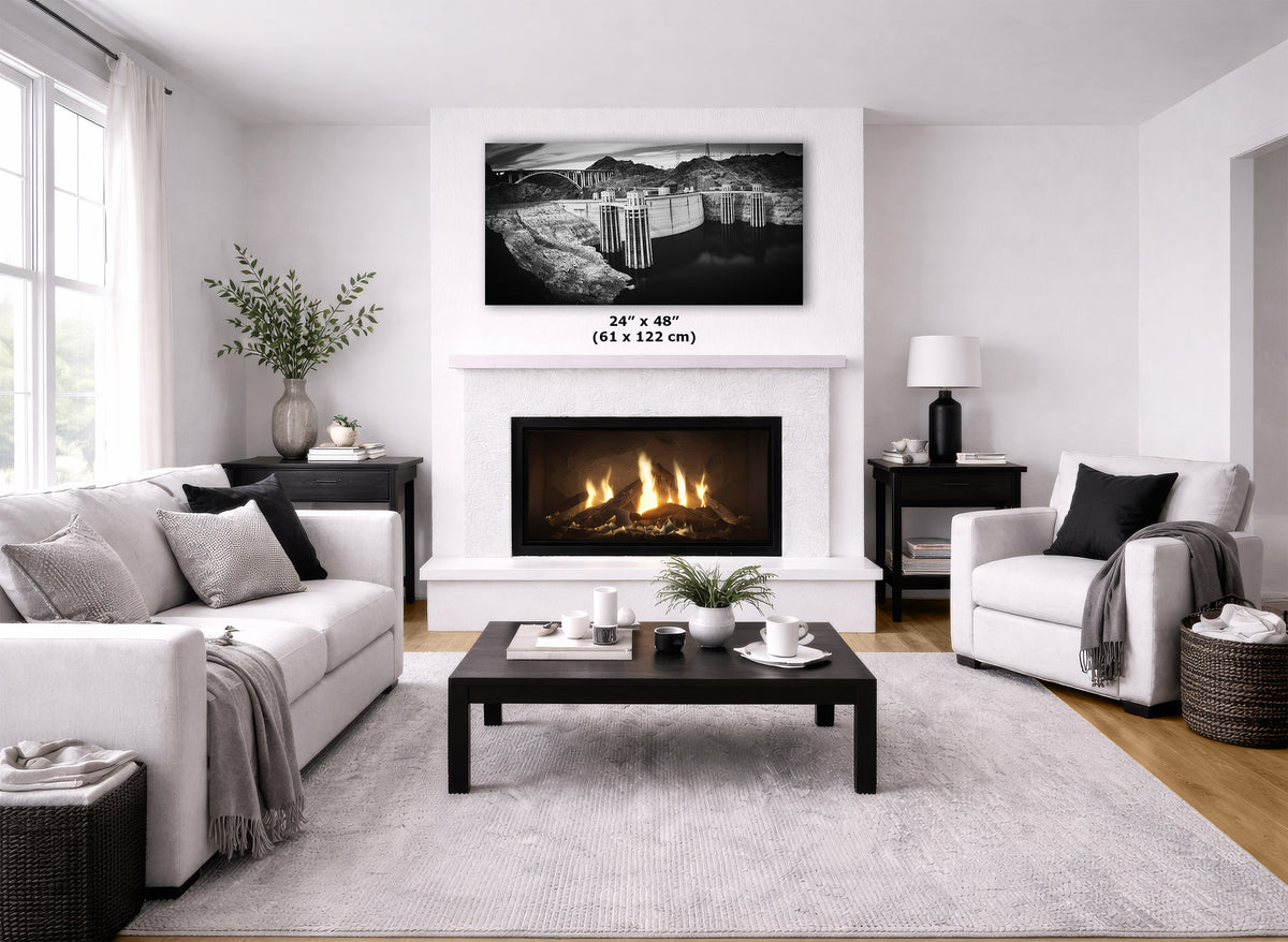 A modern living room with a white fireplace and wall-mounted black-and-white wall art above it. The artwork is shown as the product in a styled interior, with sofa, coffee table, rug, and decor visible.