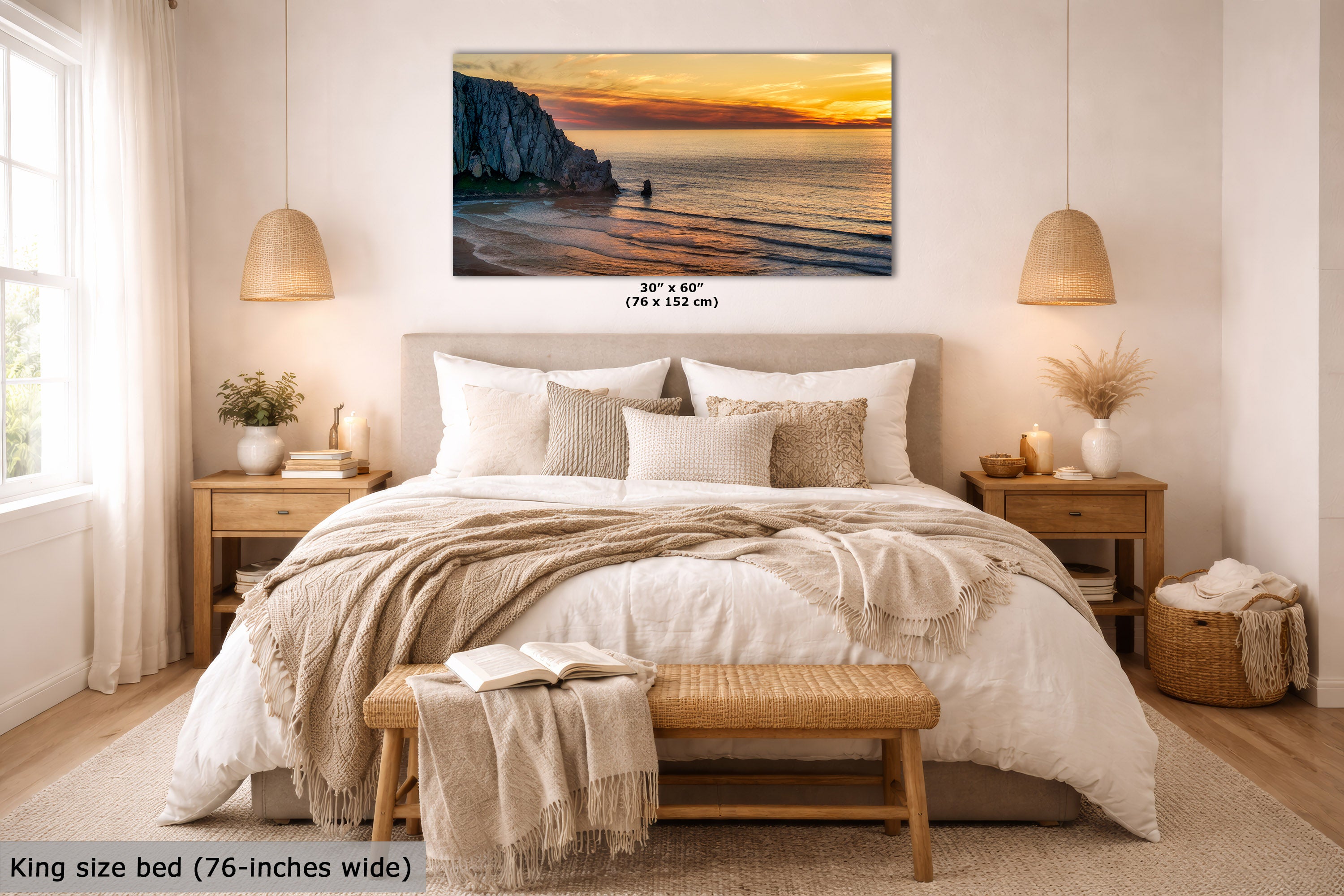 A wall art print showing a coastal sunset with cliffs and ocean waves, displayed above a neatly made bed in a bright, modern bedroom. The print includes size text reading 30 x 60 inches, and the room scene is labeled as a lifestyle context for the wall art.
