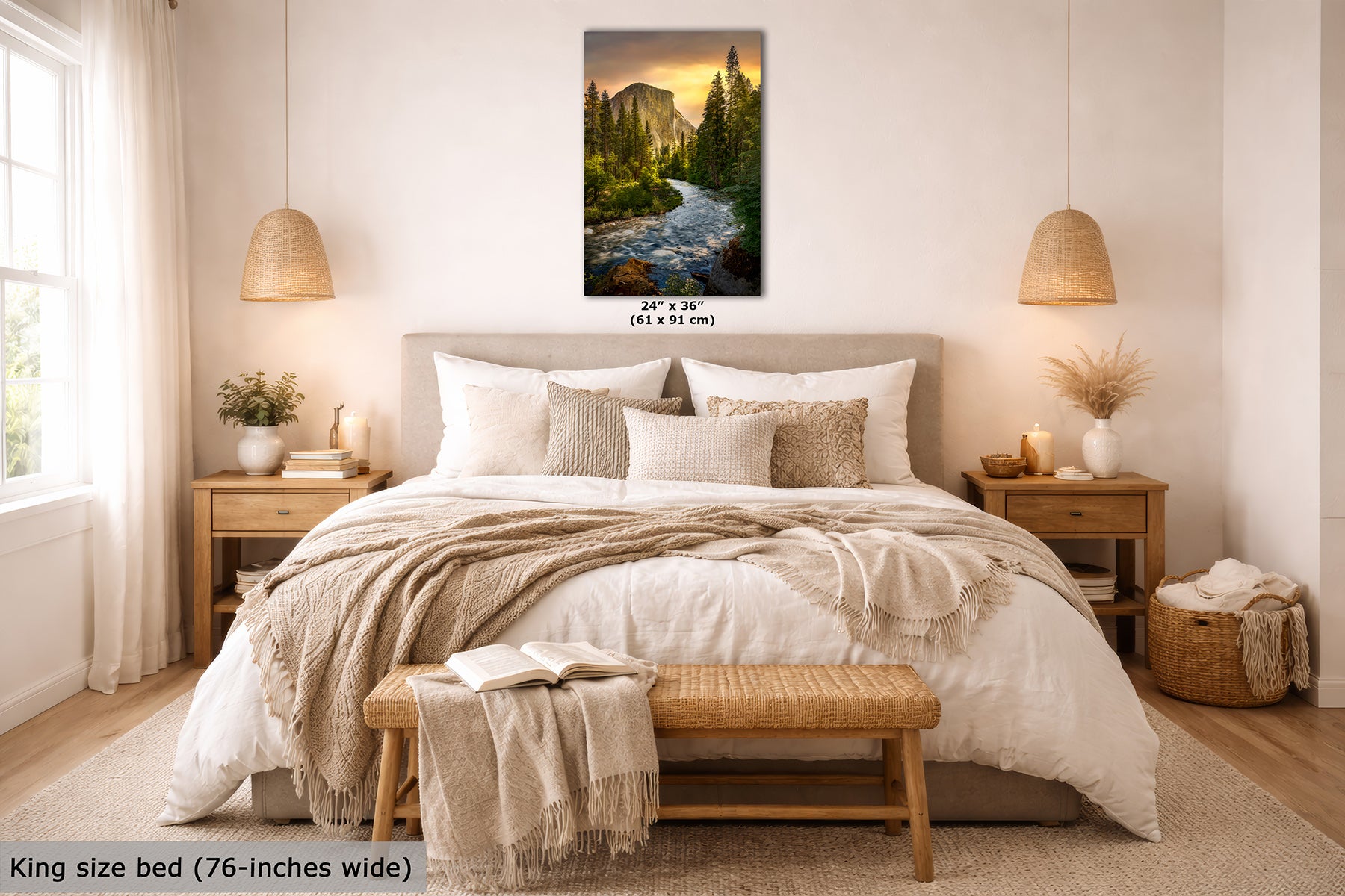 A vertical wall art print showing a Yosemite forest landscape with El Capitan mountain and a glowing sunset, displayed above a neatly made bed in a bright neutral bedroom. Small text indicates the print size as 24 x 30 inches.