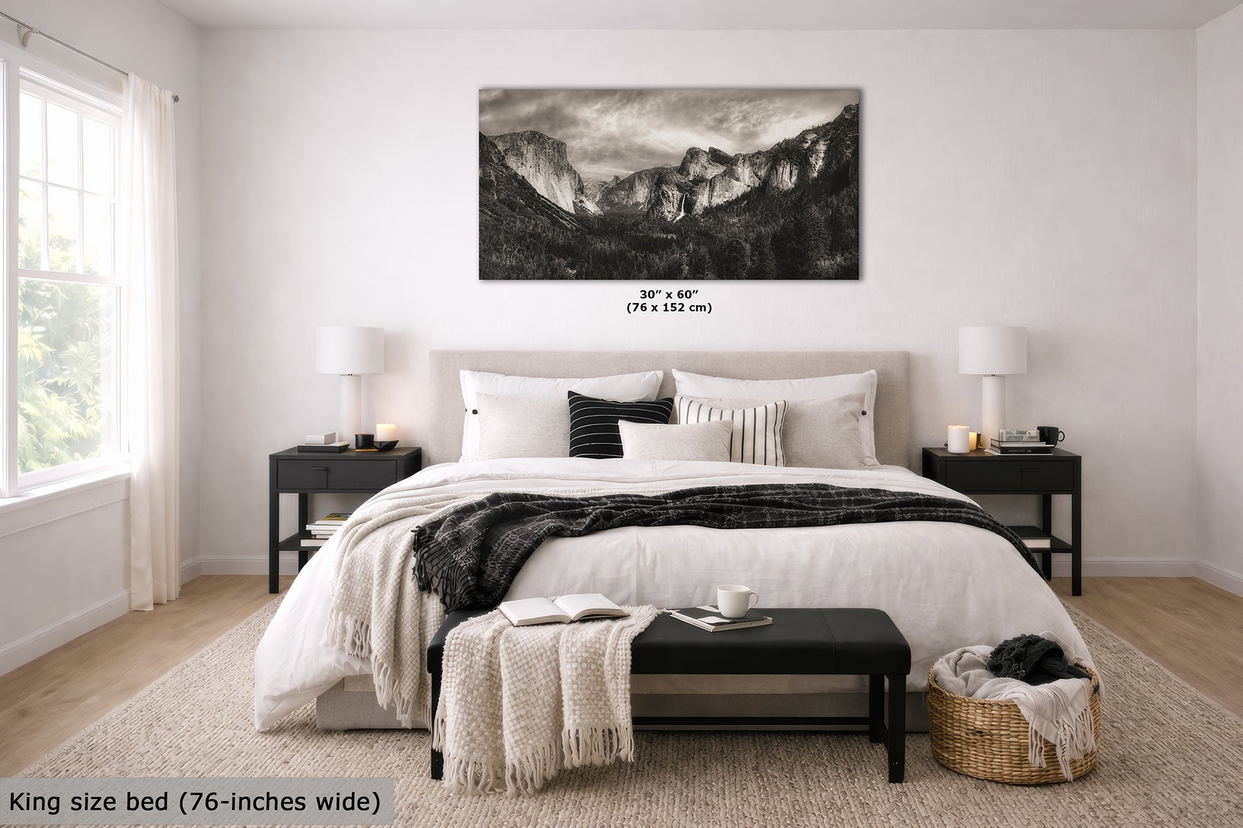 A black-and-white landscape canvas print of Yosemite Valley from Tunnel View displayed on a light gray wall above a neatly made bed in a modern bedroom setting. The text 'King size bed (76-inches wide)' is visible in the bottom left corner.