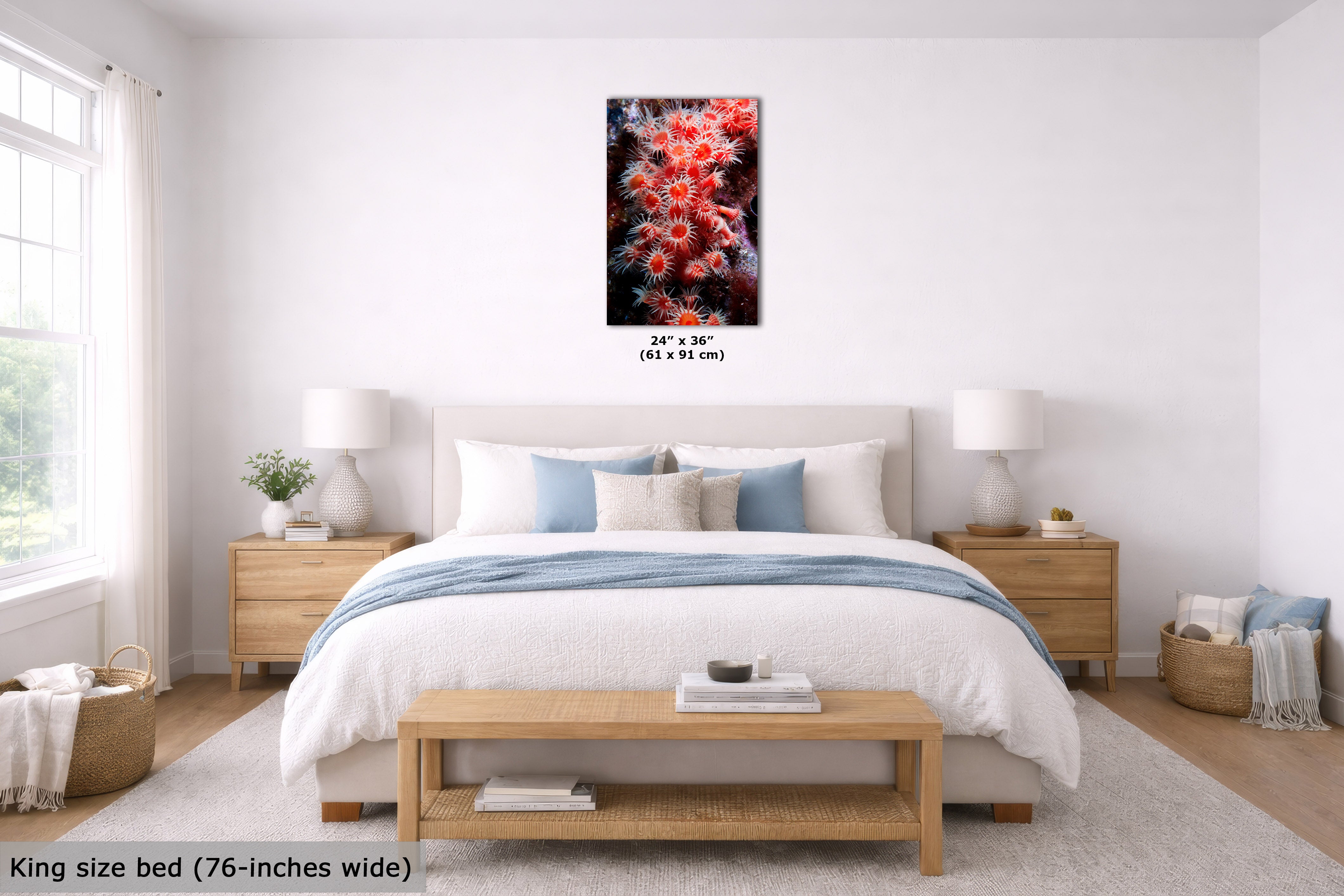 A bedroom scene with a bed, nightstands, lamps, and a framed wall art piece above the headboard. The product being shown is the vertical floral wall art, which features a black background and vivid red and pink blossoms.