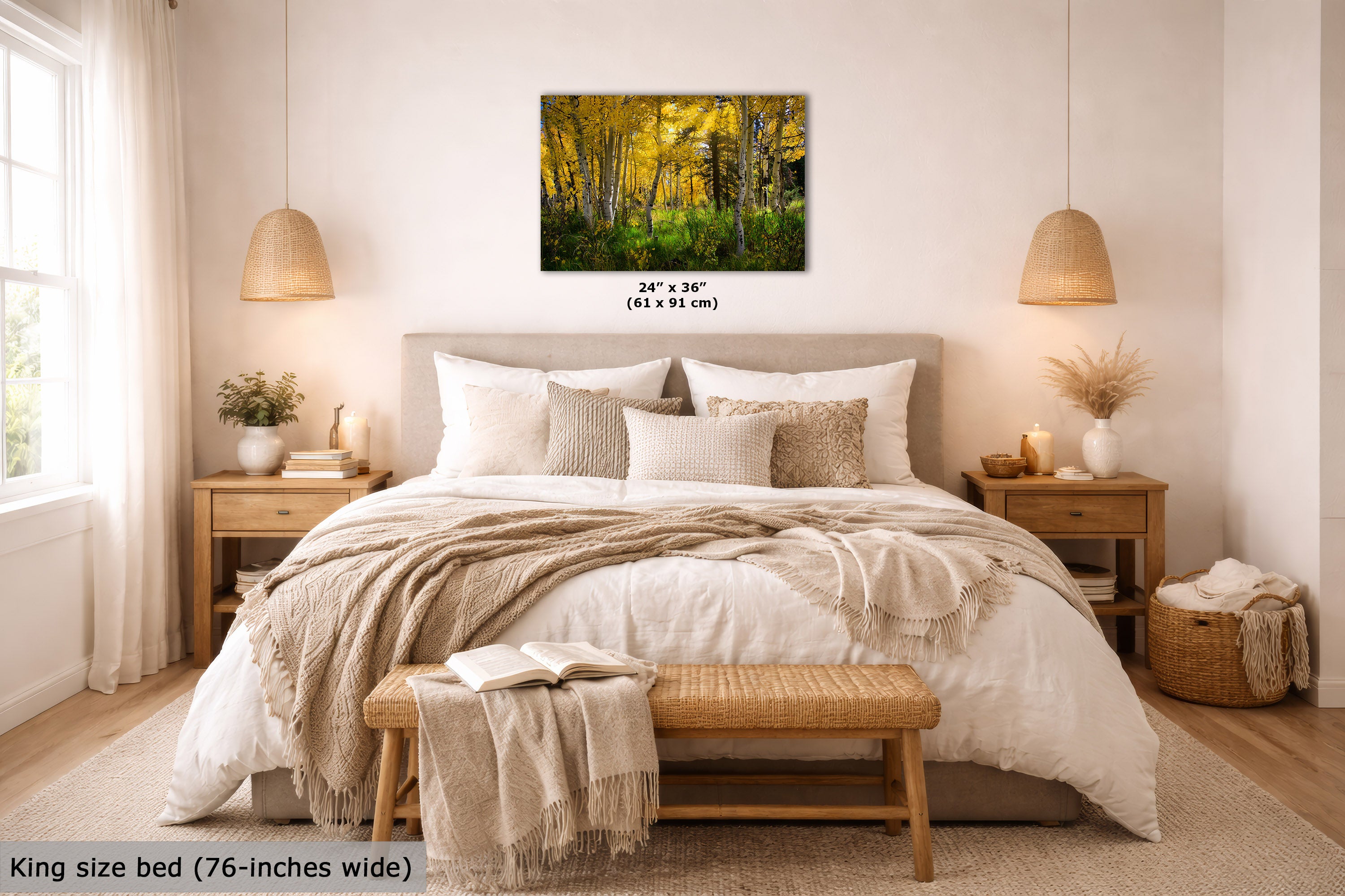 A wall art print showing a forest scene with bright yellow autumn trees and green undergrowth, displayed above a neatly made bed in a styled bedroom. The print includes size text reading 24" x 36" (61 x 91 cm), and the room scene also includes a text label at bottom left saying King size bed (76-inches wide).