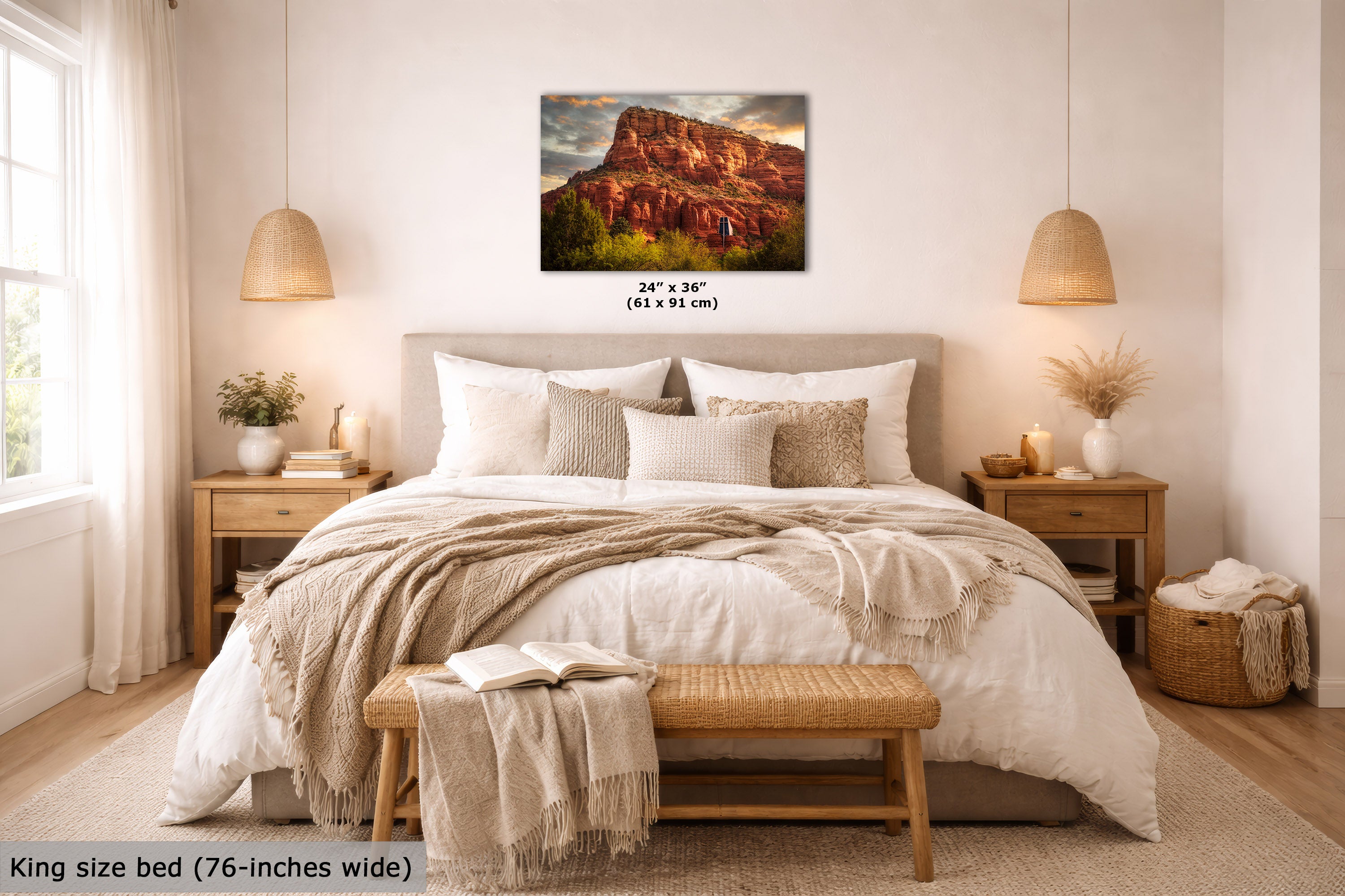 A wall art print showing a desert rock landscape is displayed above a neatly made bed in a bright, modern bedroom. The print includes size text reading 24 x 36 inches (61 x 91 cm), and the room scene also includes a text label at the bottom left stating King size bed (76-inches wide).