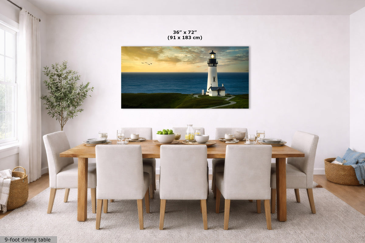 A framed wall art print showing a lighthouse by the ocean, displayed above a dining table in a bright modern dining room. The print includes size text reading 36 x 72 inches (91 x 183 cm).