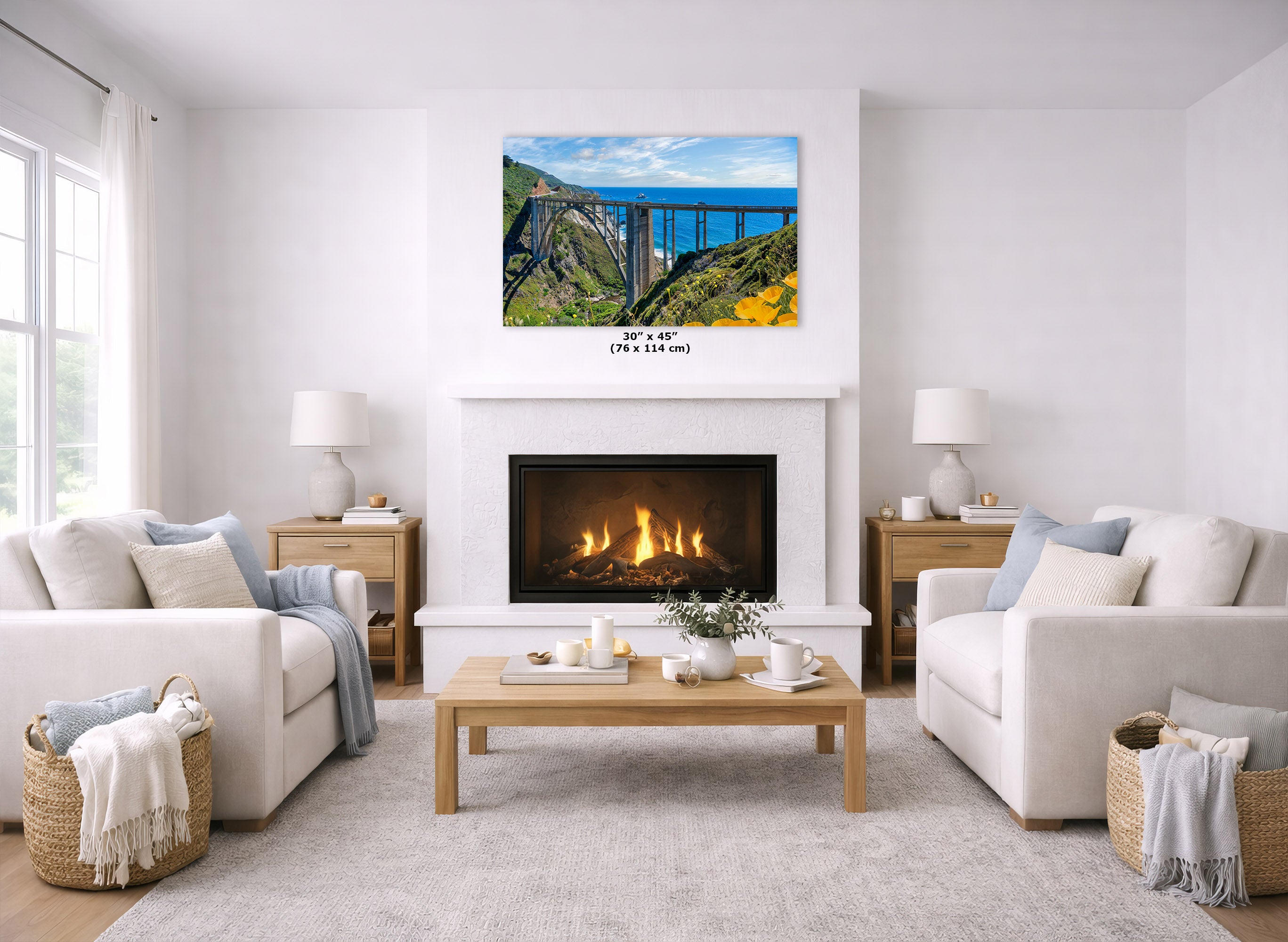 Living room with a fireplace, white walls, and a scenic wall art above it.