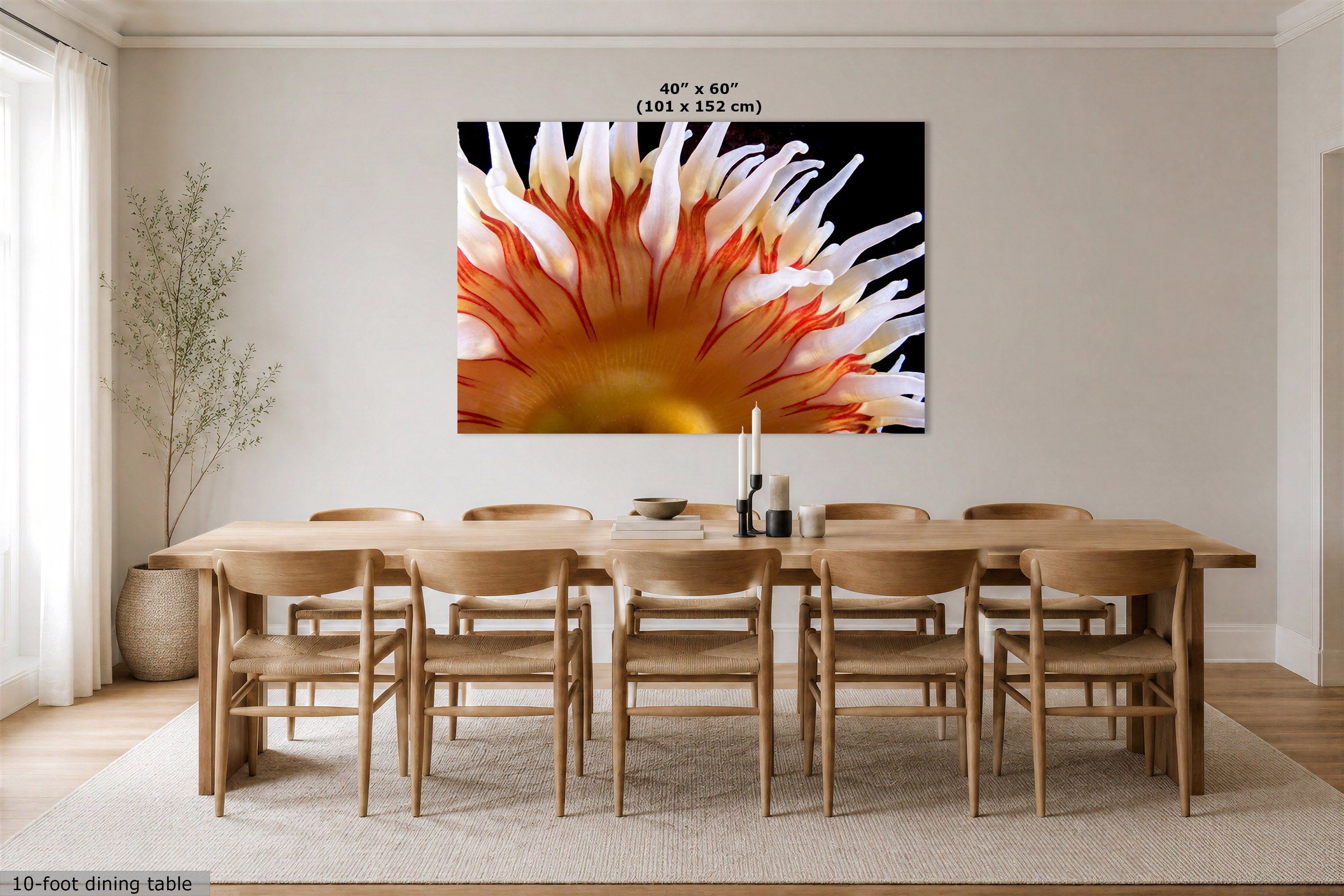A large wall art print displayed above a light wood dining table and chairs in a bright, modern dining room. Text at the top of the print indicates 40" x 60" (101 x 152 cm).