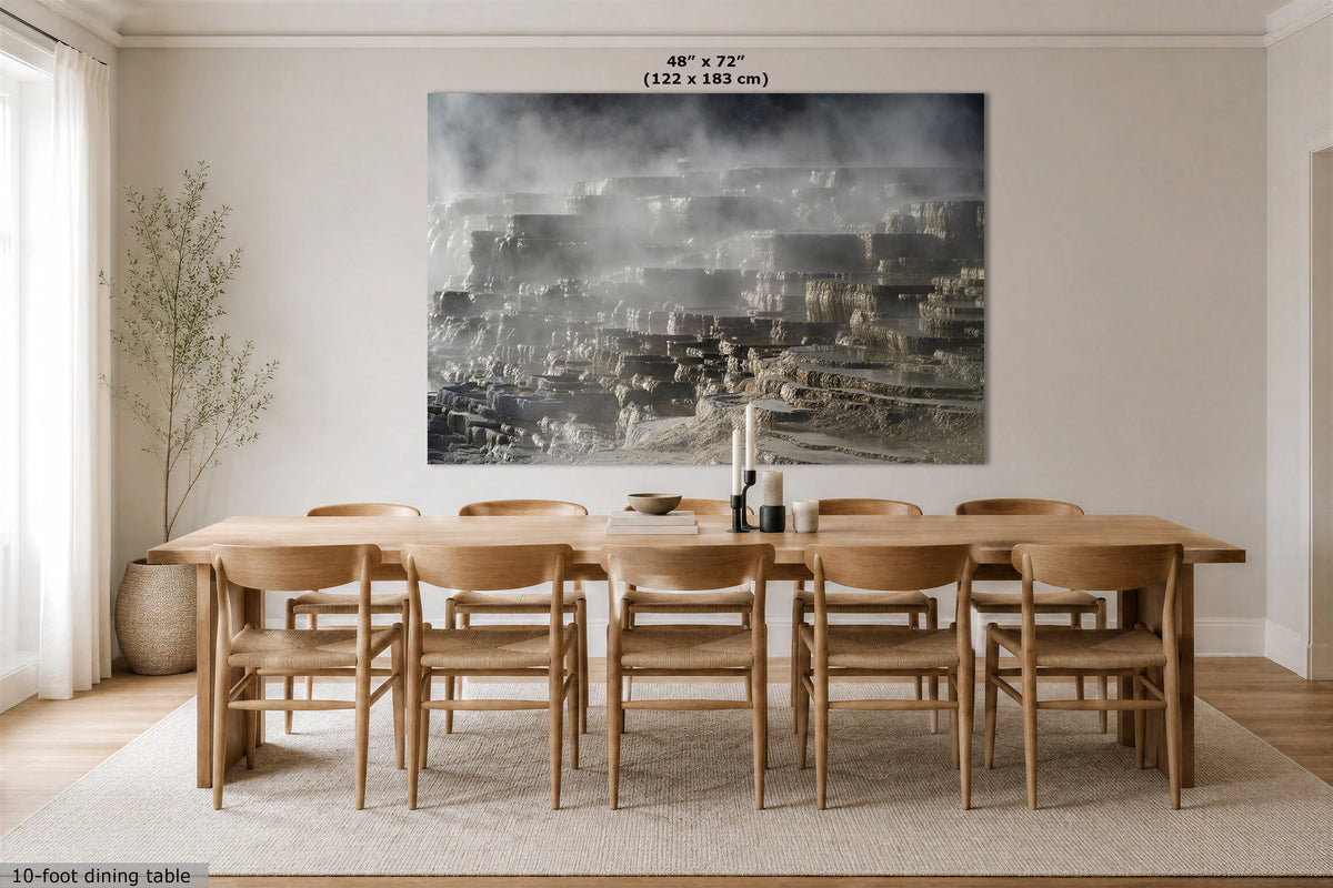A duotone wall art print depicting a Travertine terrace from Mammoth Hot Springs, Wyoming , displayed in a dining room above a wooden dining table and chairs. The image includes a size label at the top of the print and a 10-foot dining table label at the bottom left.