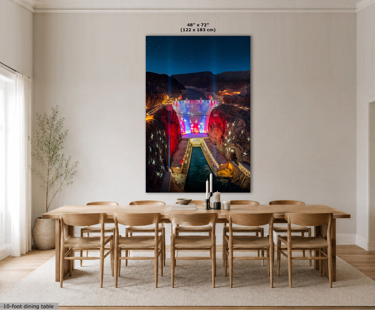 A large vertical wall art print showing a colorful night scene over a canyon or gorge, displayed above a wooden dining table and chairs in a bright neutral dining room. Text at the top reads 48" x 72" (122 x 183 cm), and a small note at bottom left says 10-foot dining table.
