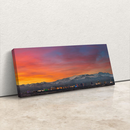 a picture of a sunset with mountains in the background