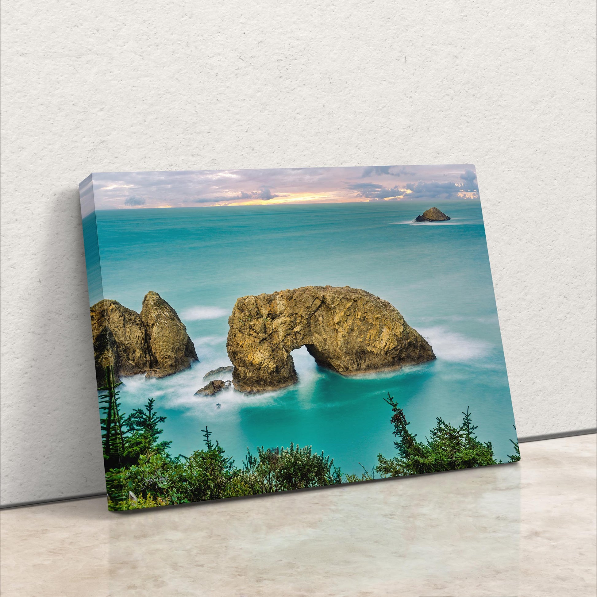 a painting of a rock formation in the ocean