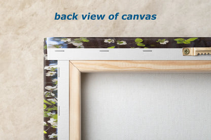 the back view of a picture frame with flowers on it