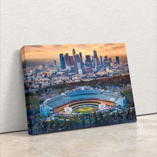 an aerial view of a baseball stadium with the city in the background