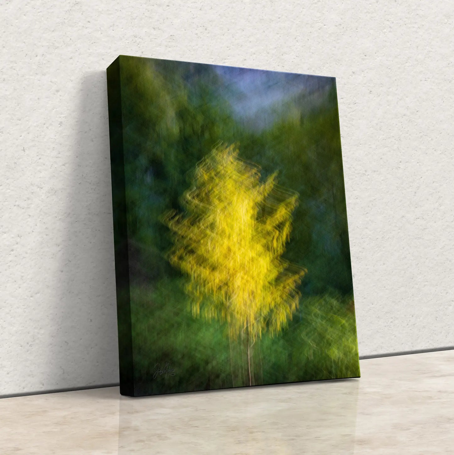 a painting of a yellow tree on a white wall