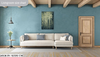 A medium 24x36 inch canvas print in a living room, portraying a duotone photograph of a dense grove of aspen birch trees with a haunting vibe.
