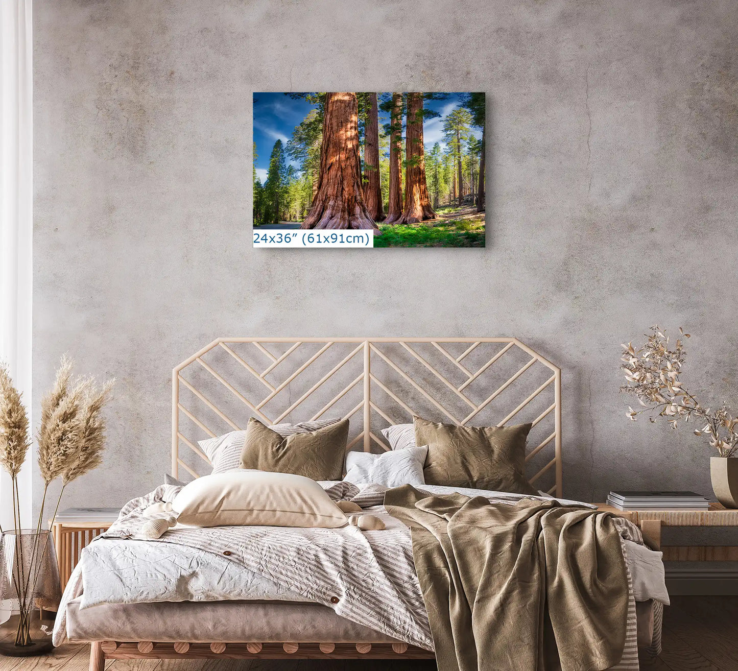 24x36 wall art print of giant sequoias displayed above a bed in a bedroom.