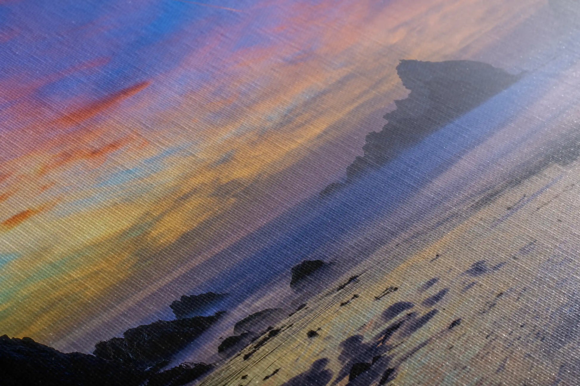 Textured detail of a canvas print, featuring the purple sand beach and moonrise at Big Sur, highlighting the fine artistry.