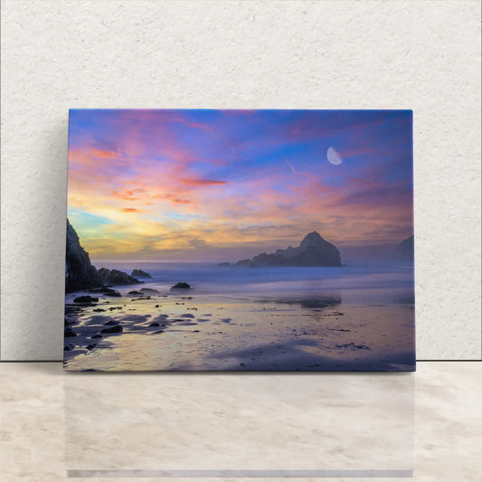 Canvas art of a serene purple sand beach at sunset in Big Sur, California, with a crescent moon rising over calm seas.