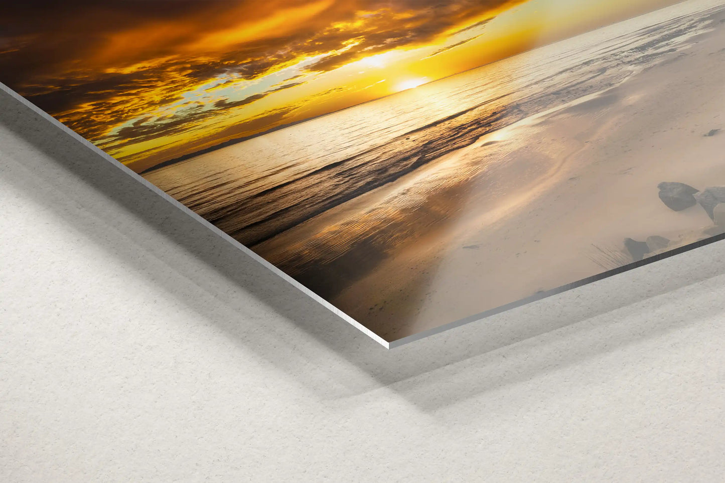 Detail of a metal print edge, featuring the Hobson Beach sunset, emphasizing the durable, sleek medium enhancing the image's vibrancy.