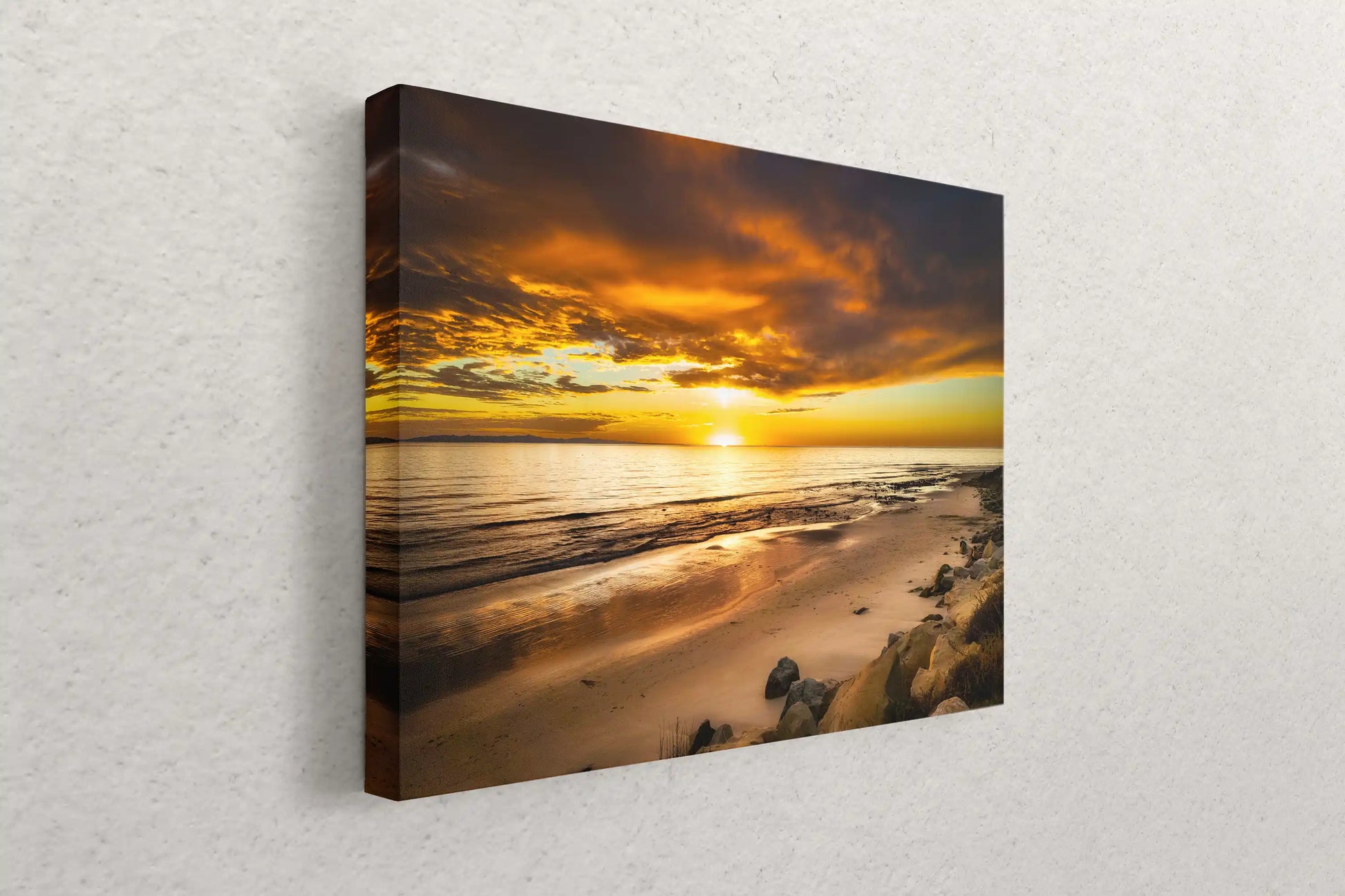 Side view of a canvas wall art featuring a breathtaking Hobson Beach sunset, the image wrapping around the edges for a continuous display of nature.