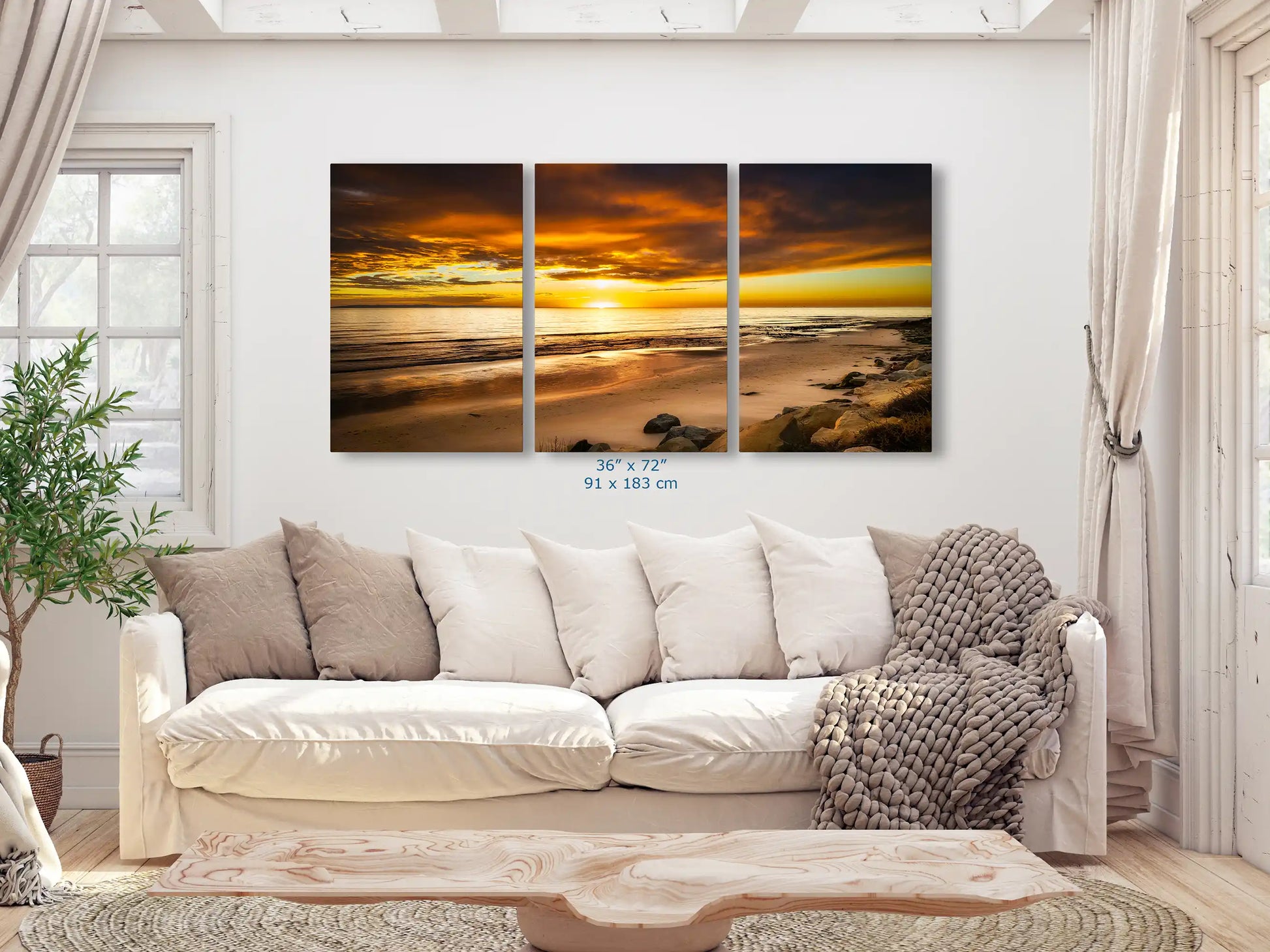 Large 36x72 wall art of Hobson Beach's sunset commands the living space with its mesmeric, vivid colors and transcendent tranquility.