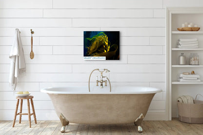 A 16x20 inch canvas print of golden kelp illuminated in dark waters, hung above a classic bathtub for a tranquil bathroom decor.
