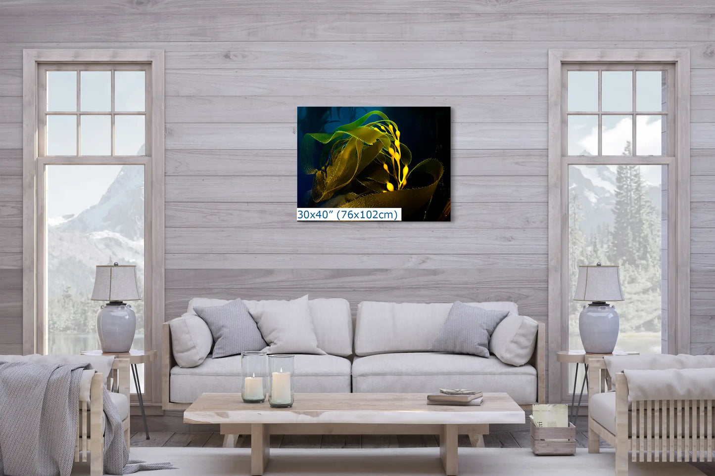 A large 30x40 inch canvas print of an underwater kelp scene creating a focal point in a contemporary living room.