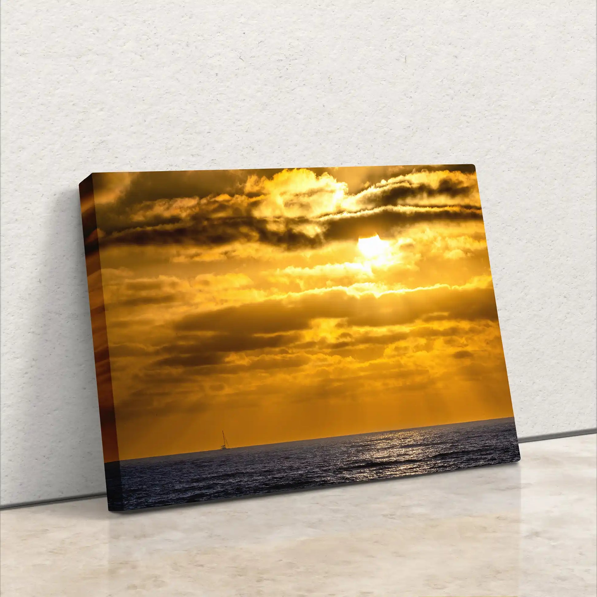 Side view of a canvas print depicting a California sunset, emphasizing the thickness and side image continuation.