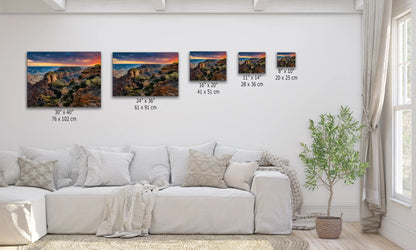 Cape Royal of Grand Canyon Sunset Wall Decor shown in multiple sizes over a living room couch