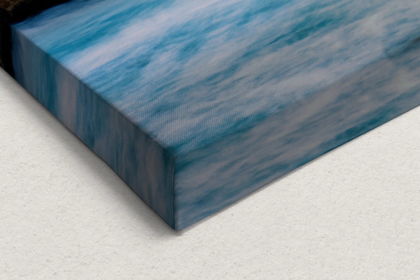 Close-up of a canvas corner showing the smooth transition of blue hues capturing the fluidity of the California Pacific Seascape.