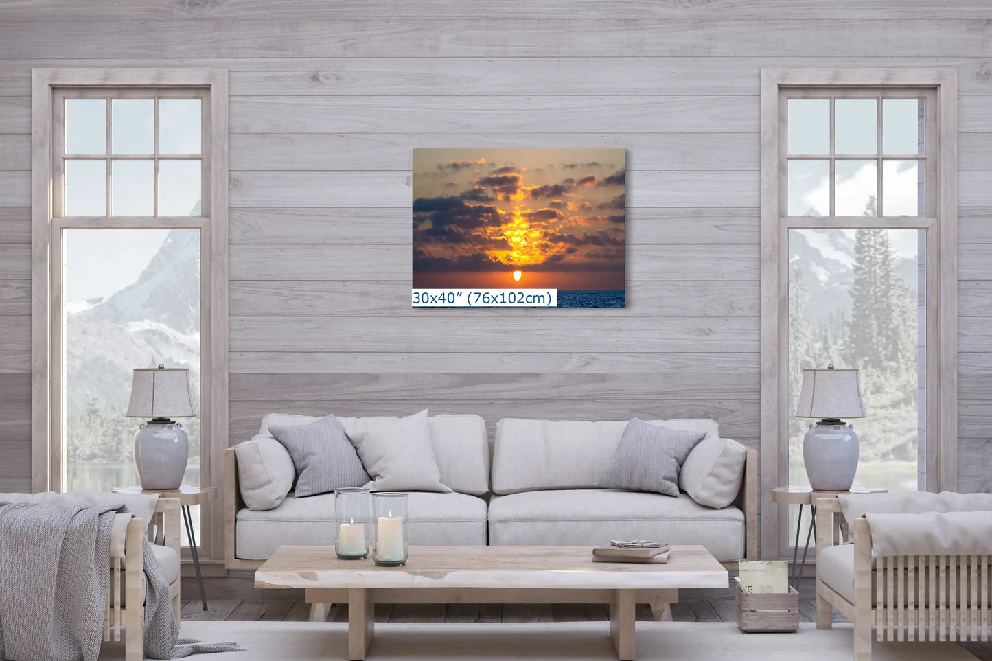 Spacious living room showcasing a large 30x40 inch canvas print of a spectacular ocean sunset scene.