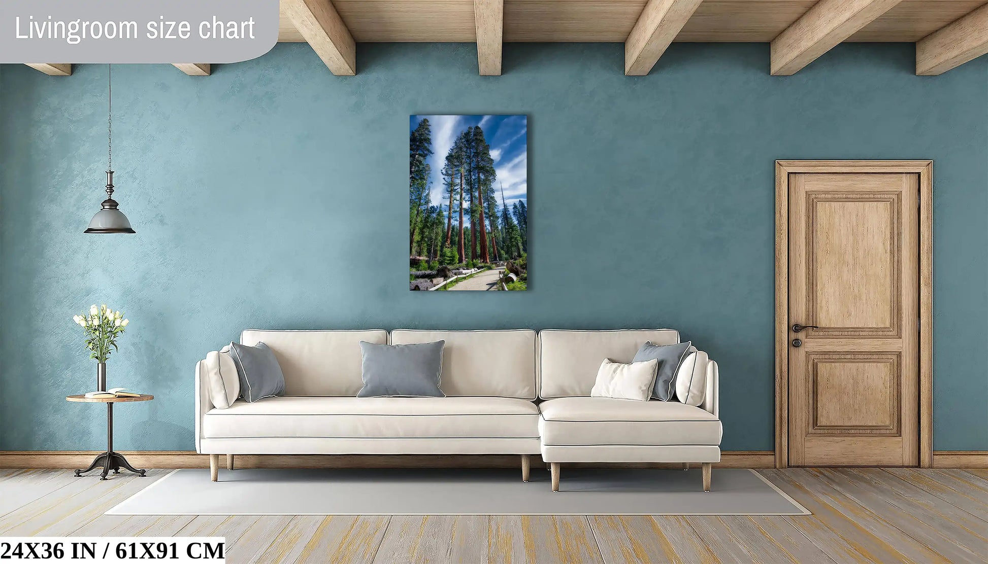 24x36 inch print of five Mariposa Sequoia trees displayed in a cozy living room with blue walls.